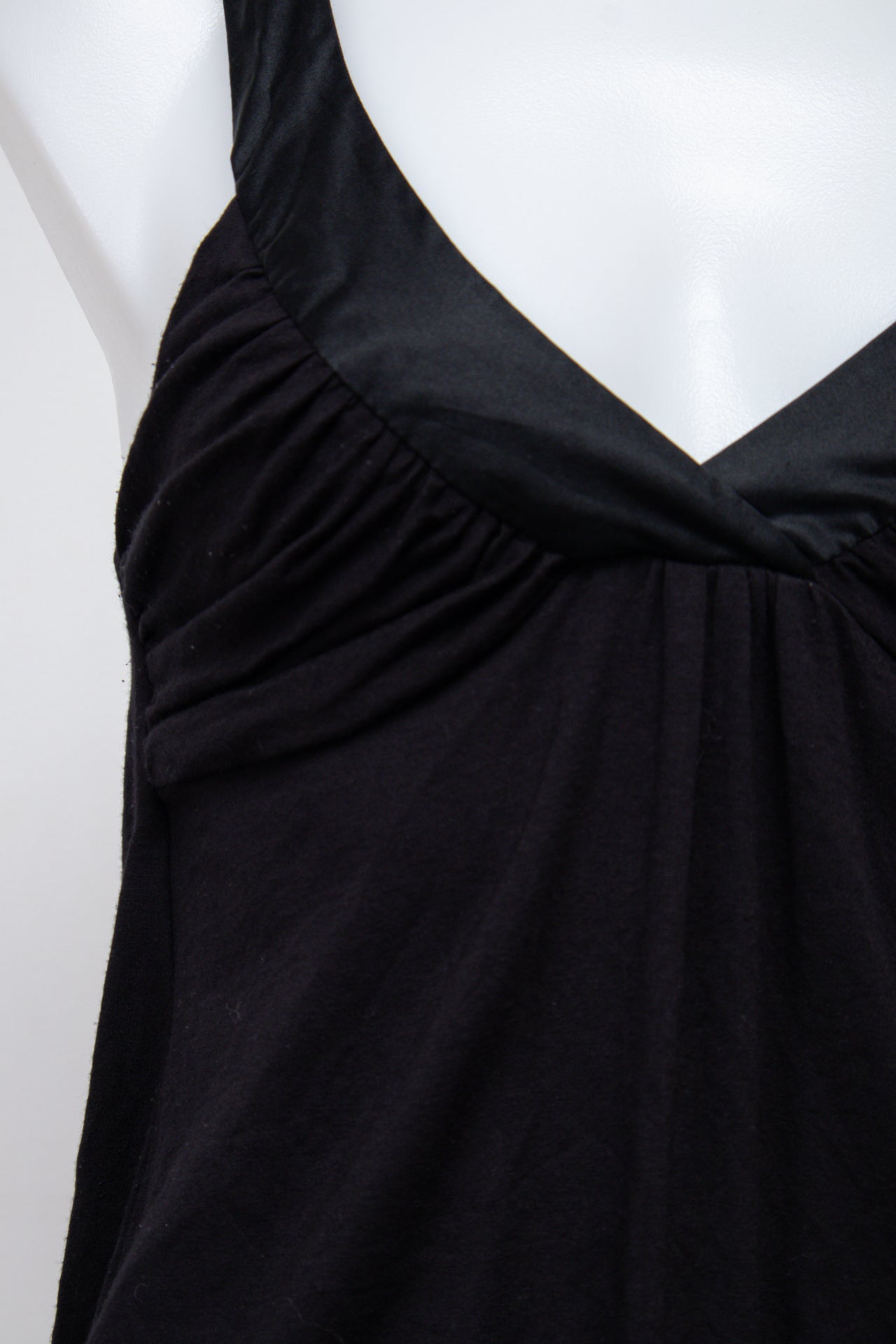 #100 Bebe Short Sleeve Black | c. 210 | Size 8