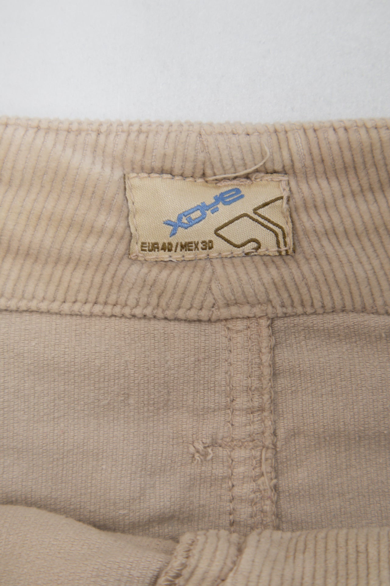 #178 Evo-e Mini Skirt Beige | c. 199 | Size 12
