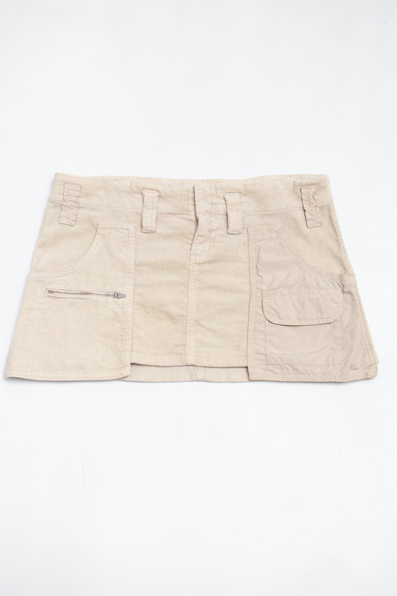 #178 Evo-e Mini Skirt Beige | c. 199 | Size 12