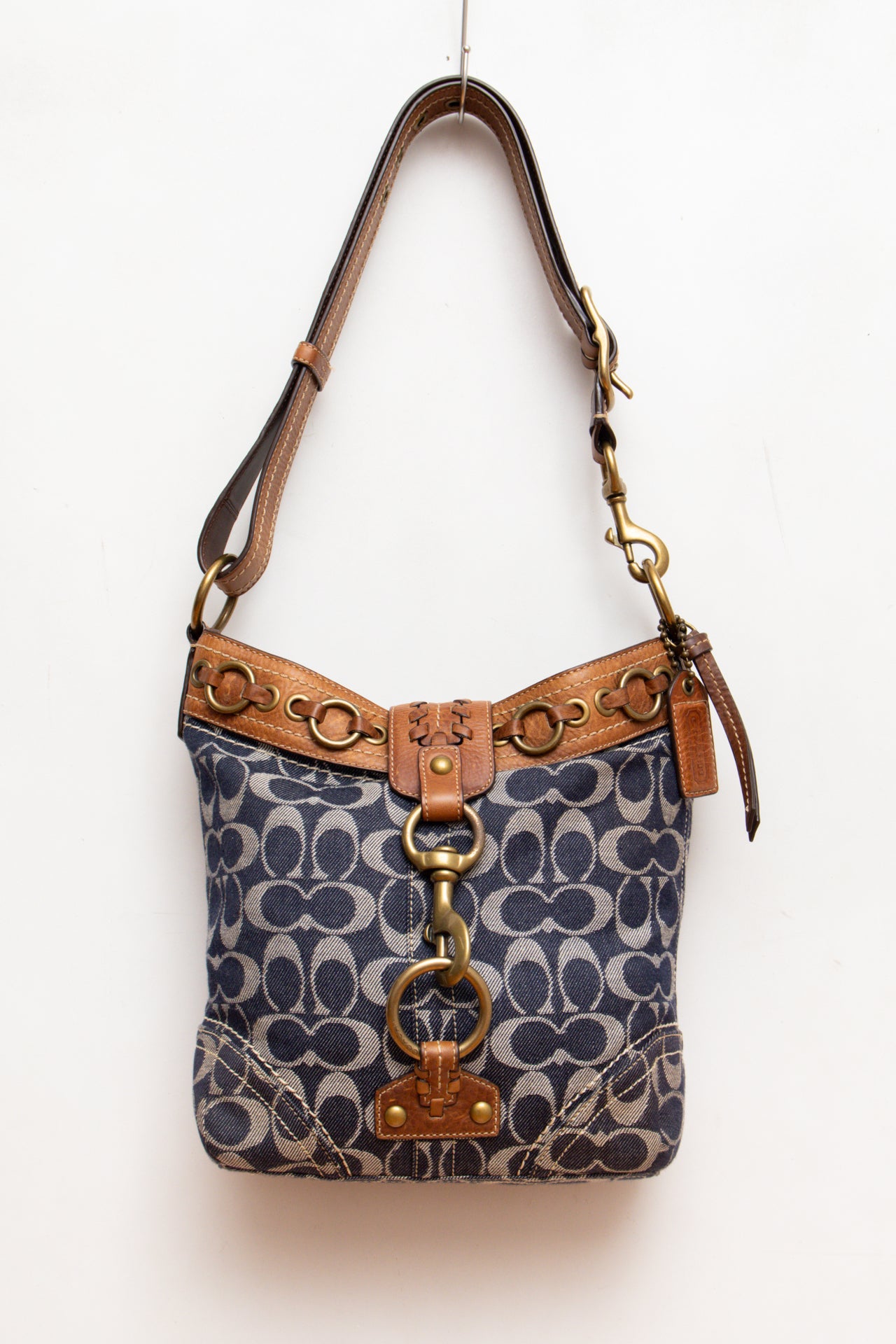 #86 Coach denim buckle bag