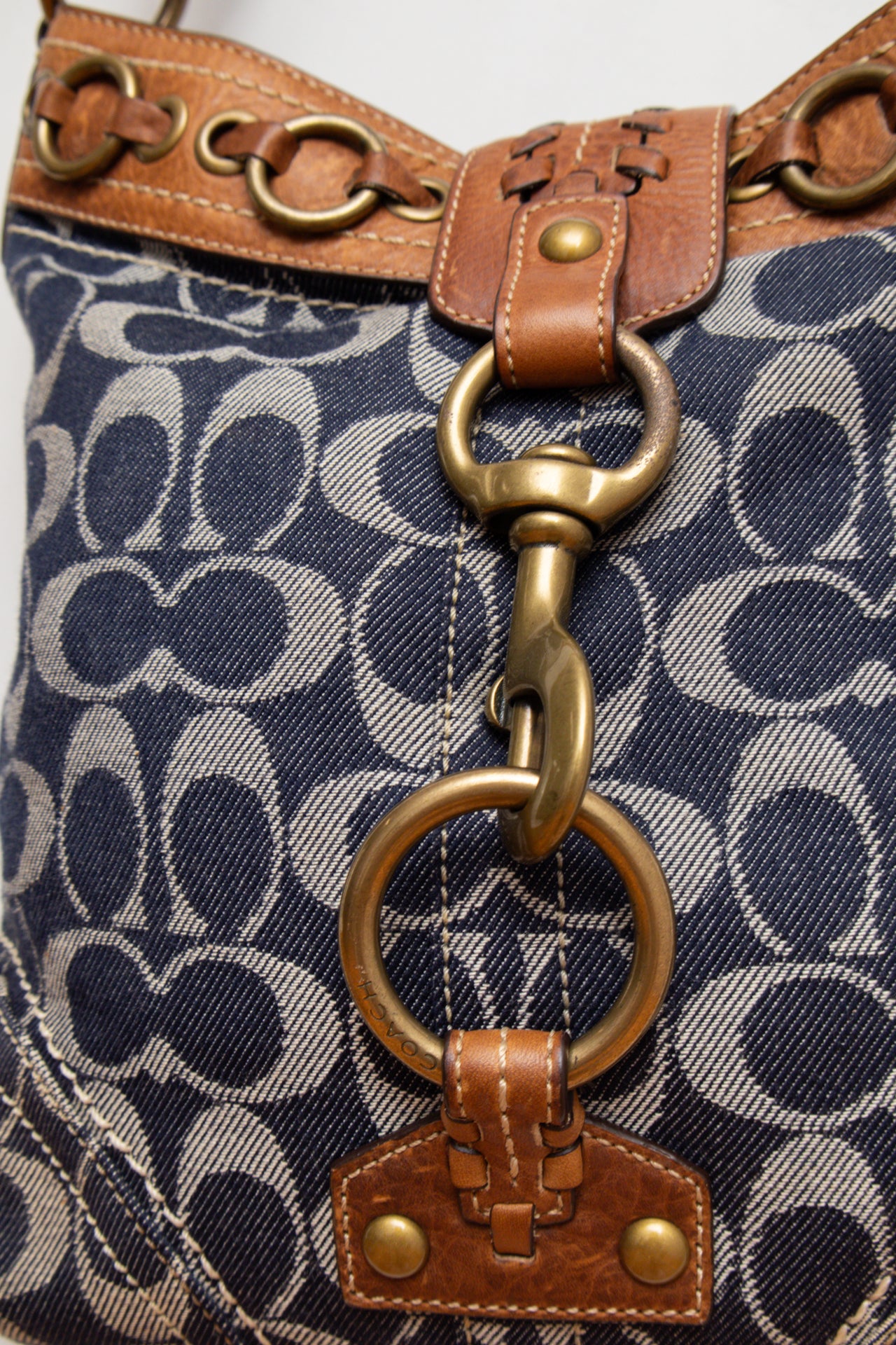 #86 Coach denim buckle bag