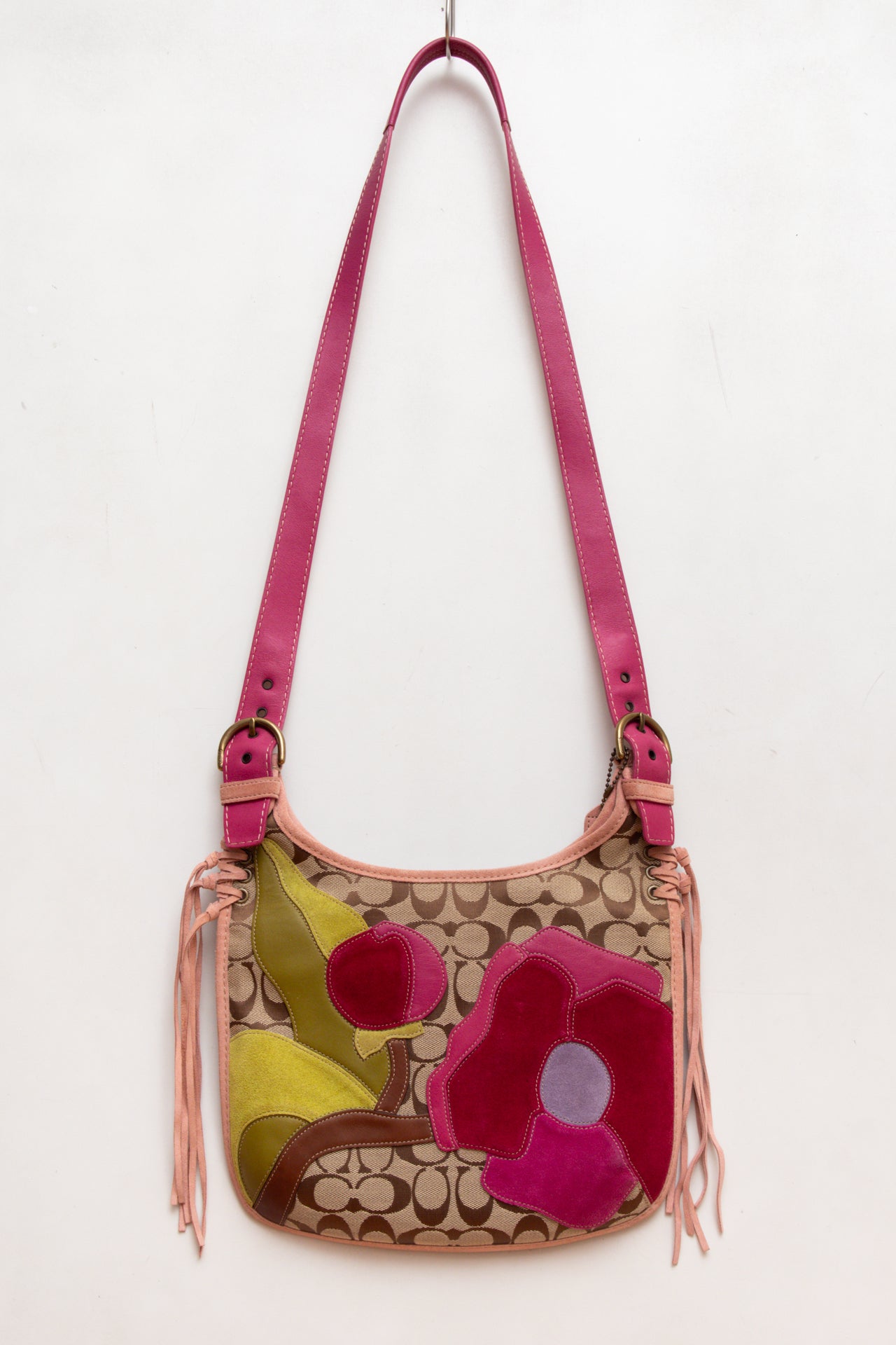 #87 Coach canvas tassel bag w suede flowers