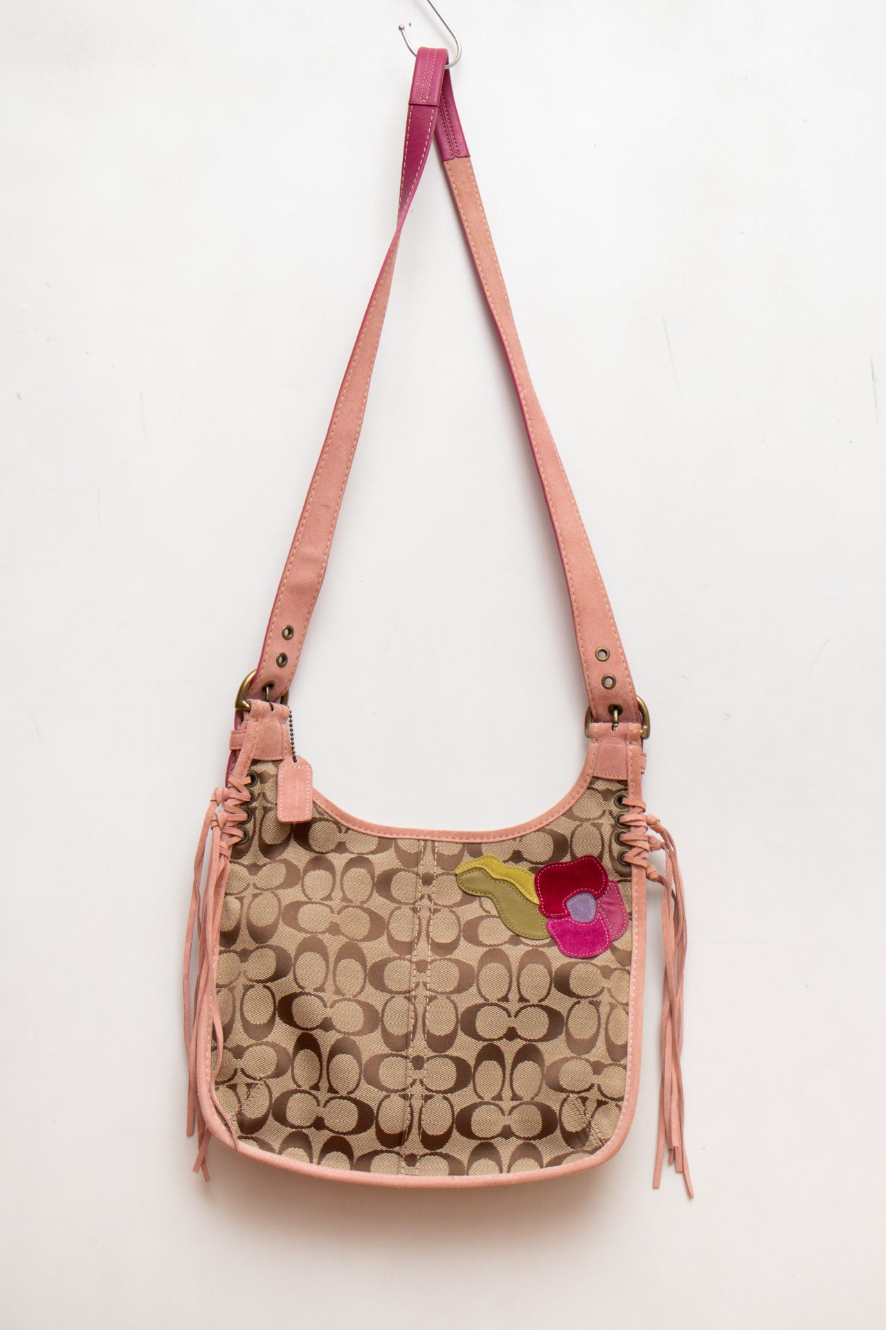 #87 Coach canvas tassel bag w suede flowers