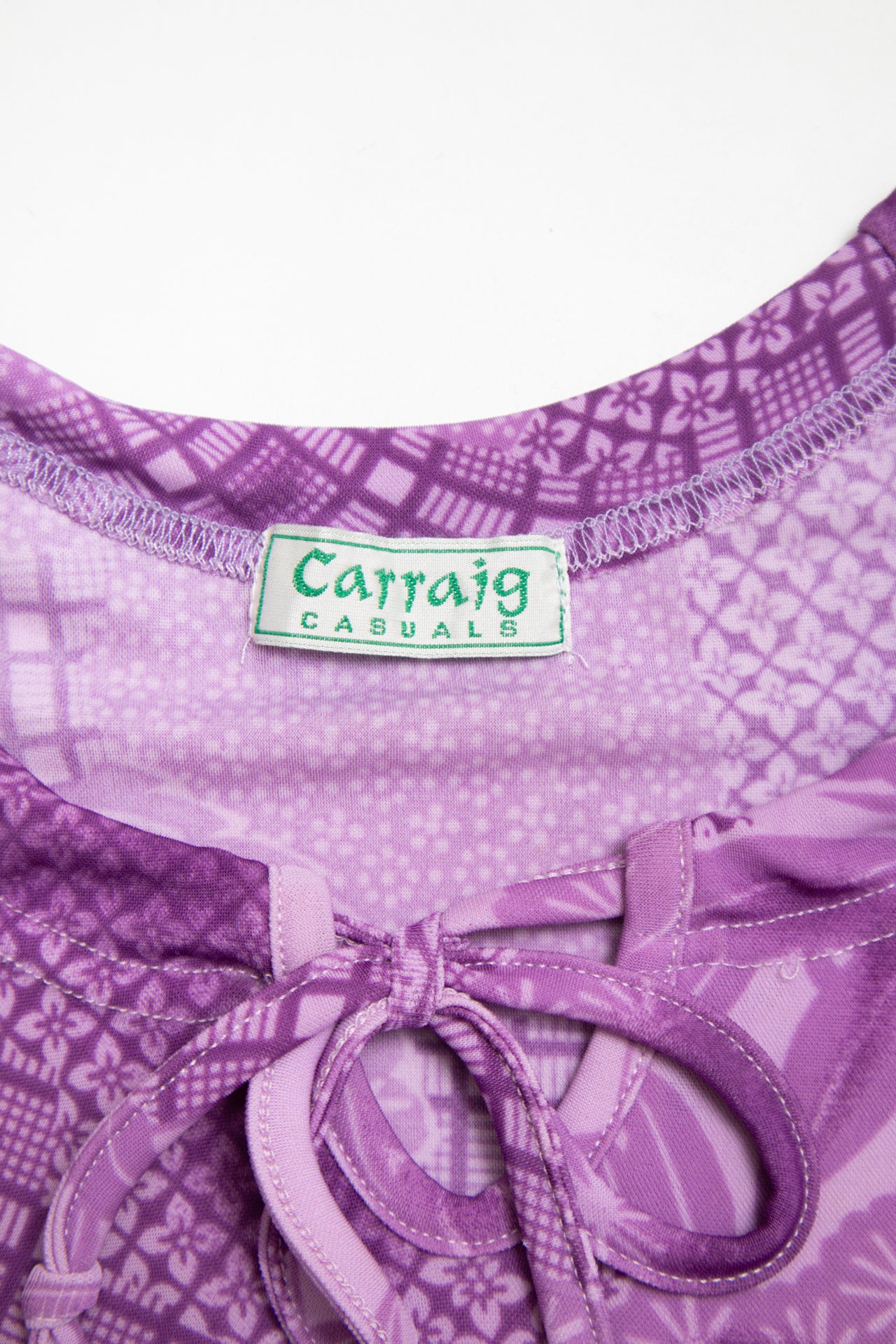 #129 purple floral patterned lettuce trim top | c. 160 | size 10