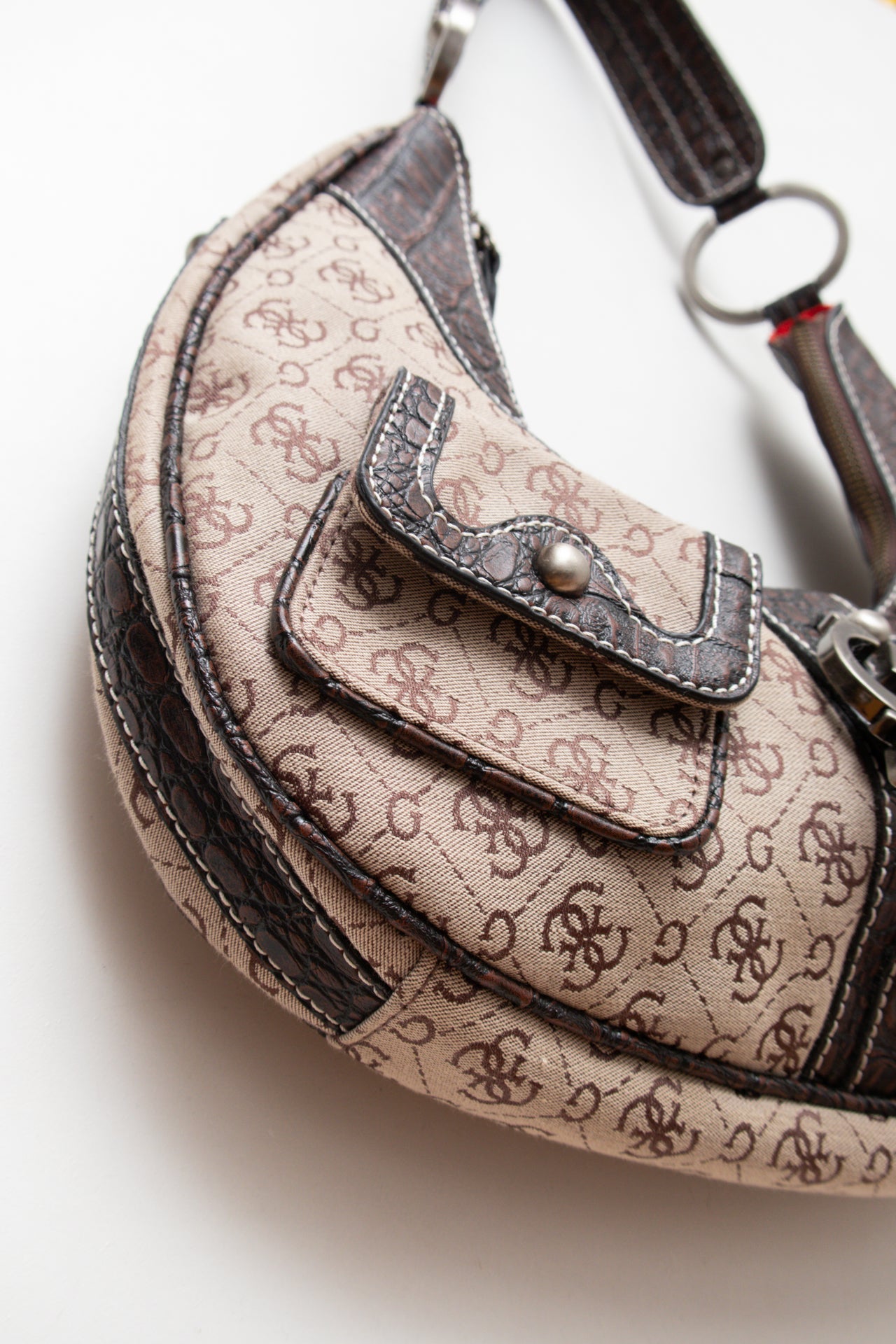 #239 embellished monogram canvas hand bag | c. 160