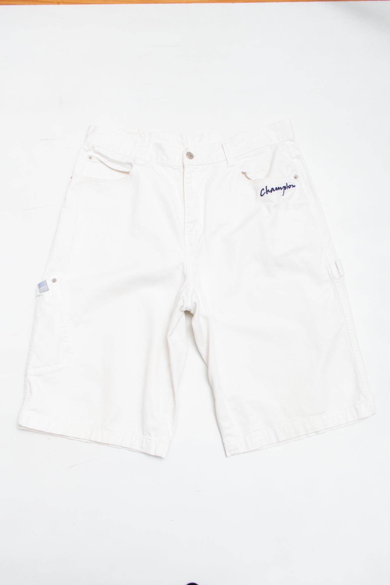 #109 Champion embroidered white shorts | c. 162 | size 8