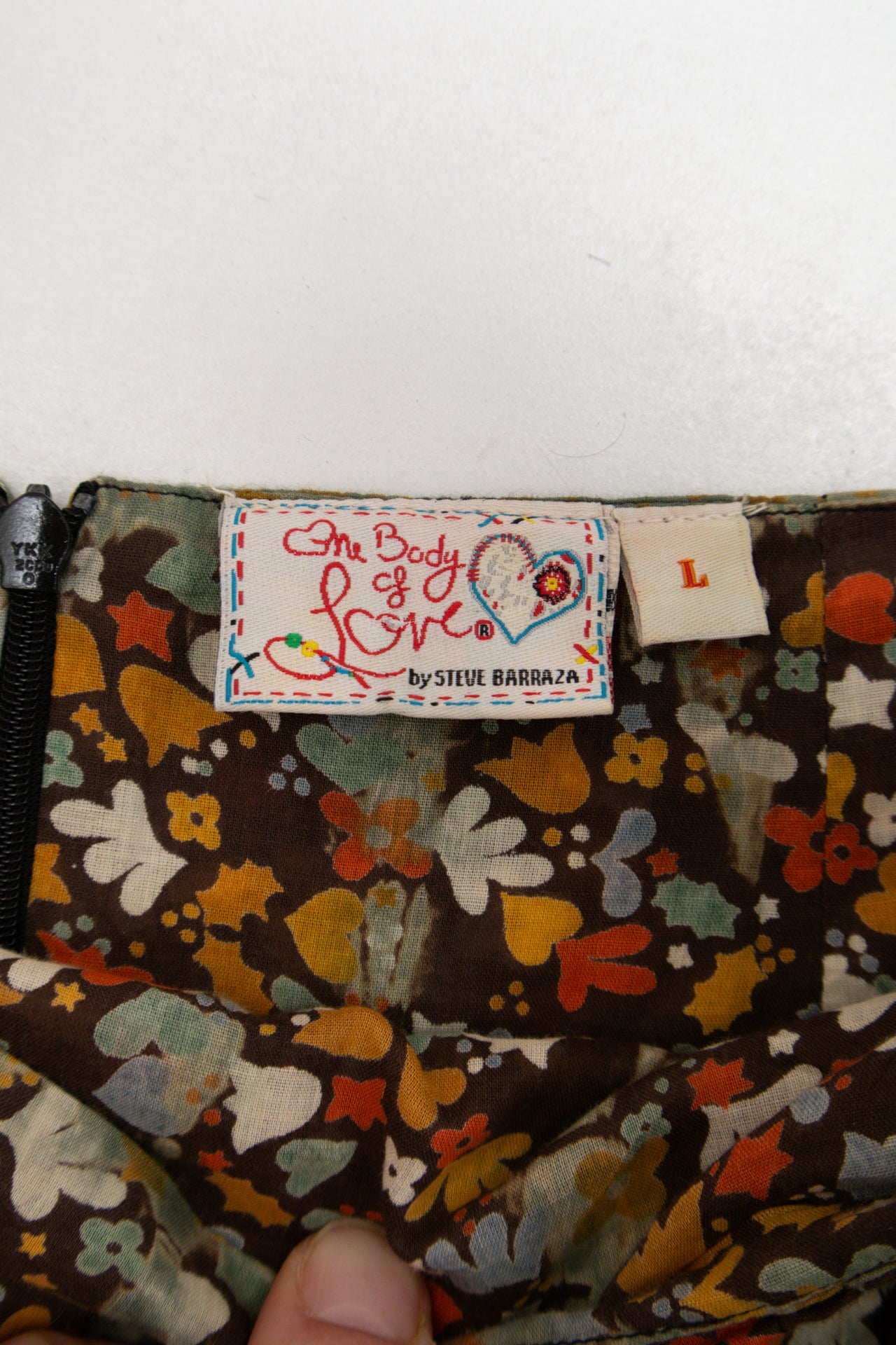 #119 asymmetrical gold embroidered cotton skirt | c. 162 | size 10