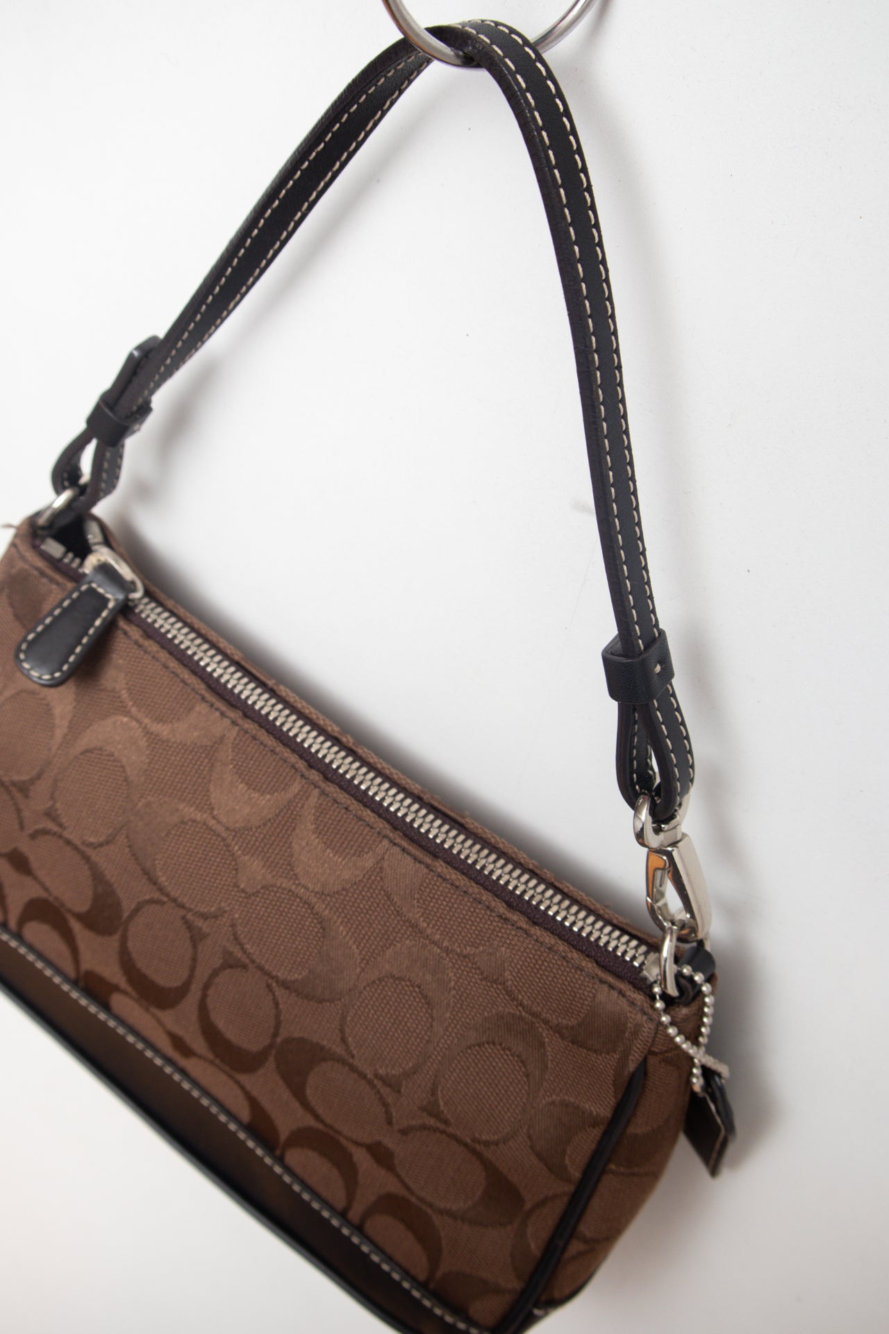 #227 Coach brown monogram demi bag | c. 162