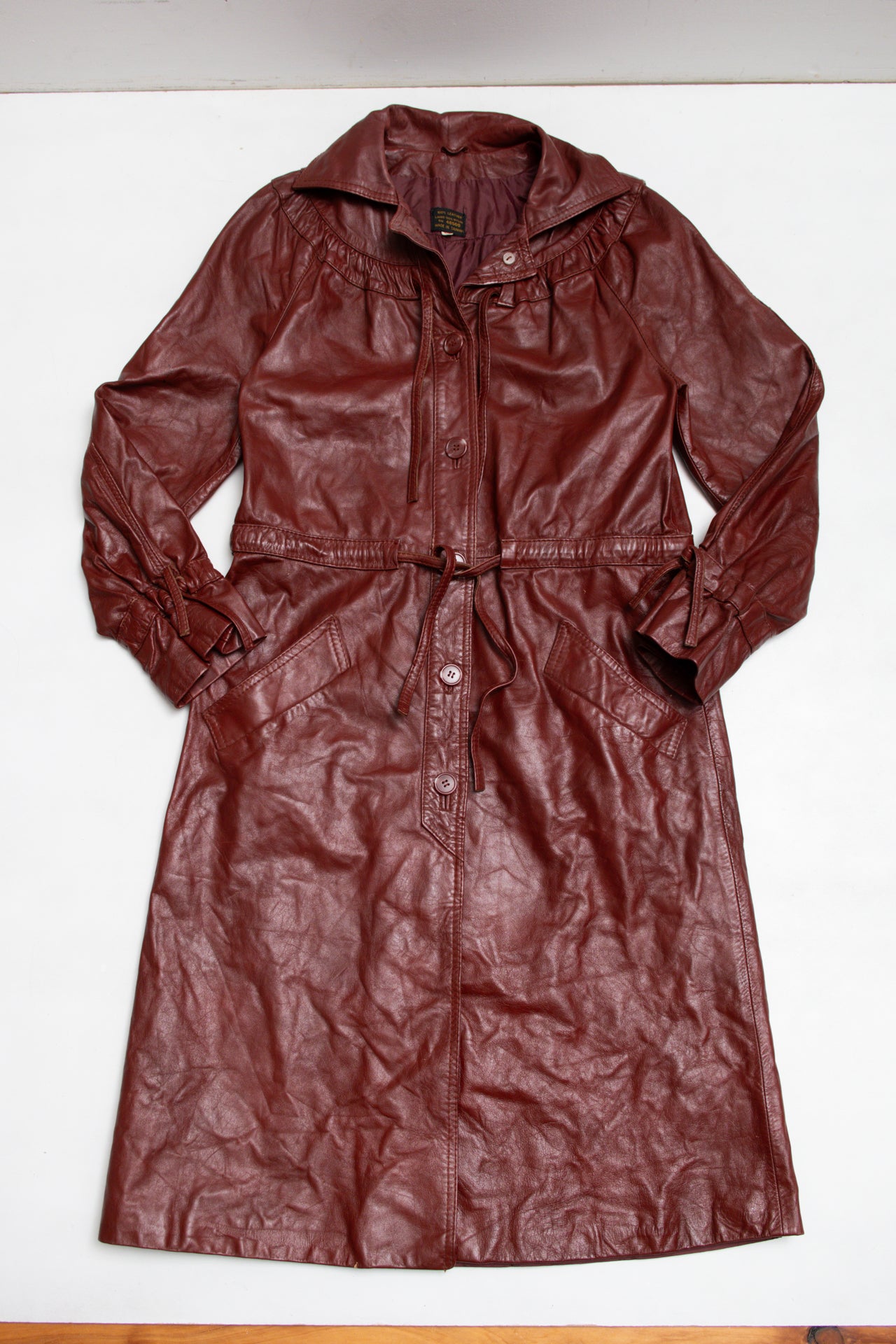 #270 burgundy leather full length jacket | c. 163 | size 8