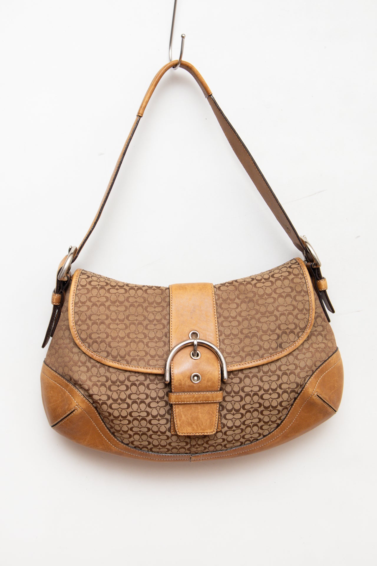 #245 Coach monogram buckle leather bag | c. 163