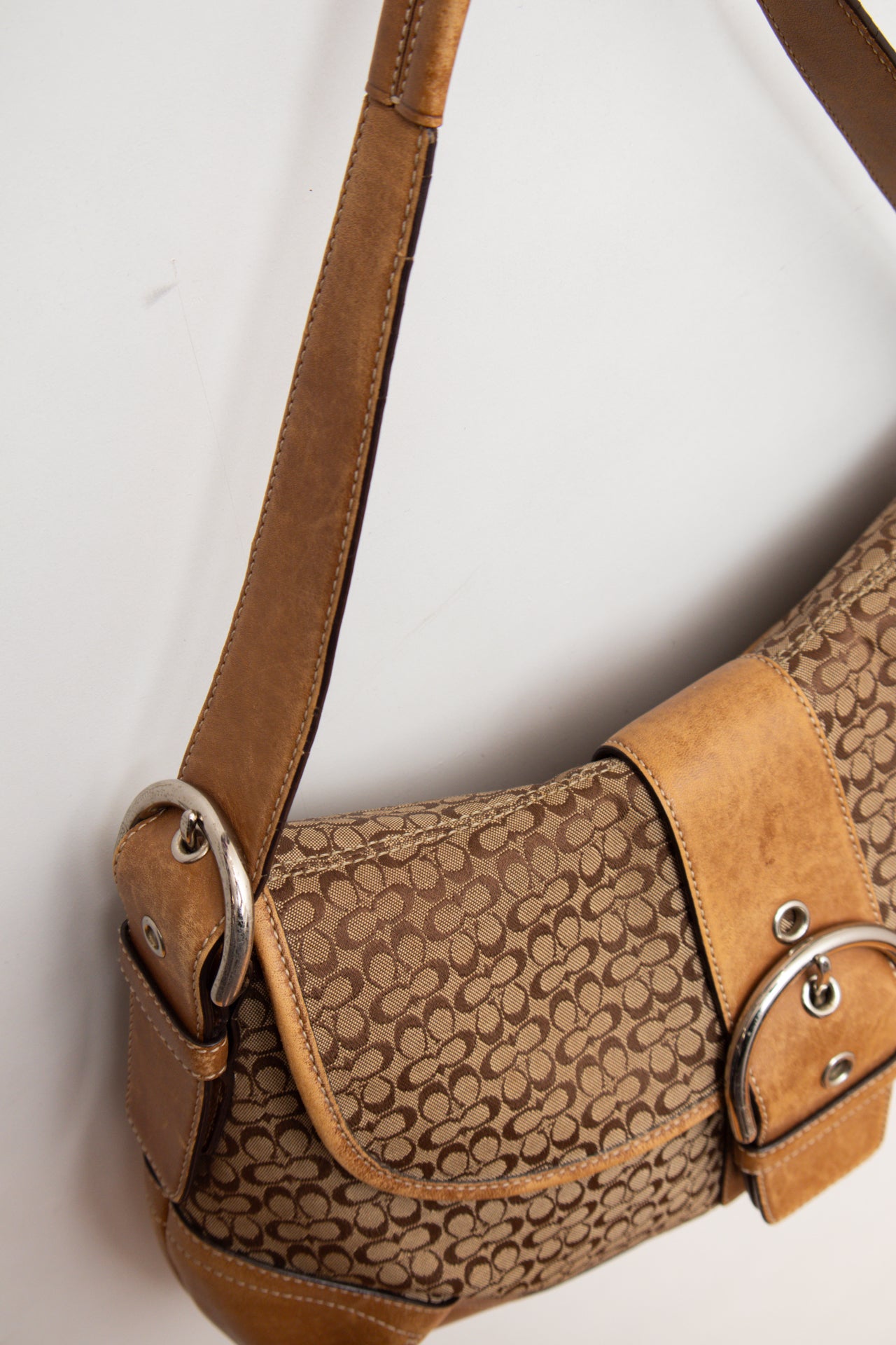 #245 Coach monogram buckle leather bag | c. 163