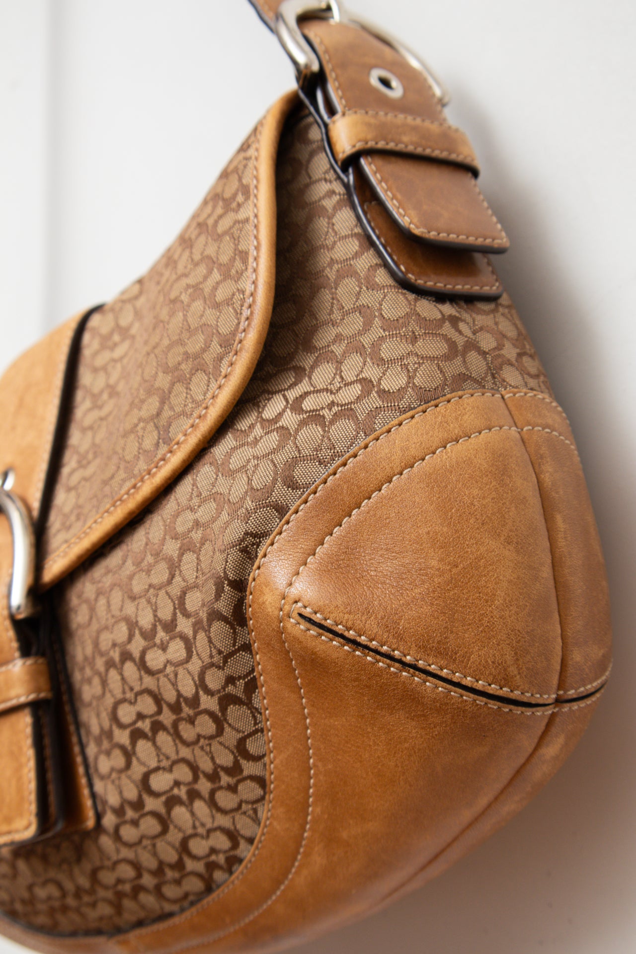 #245 Coach monogram buckle leather bag | c. 163
