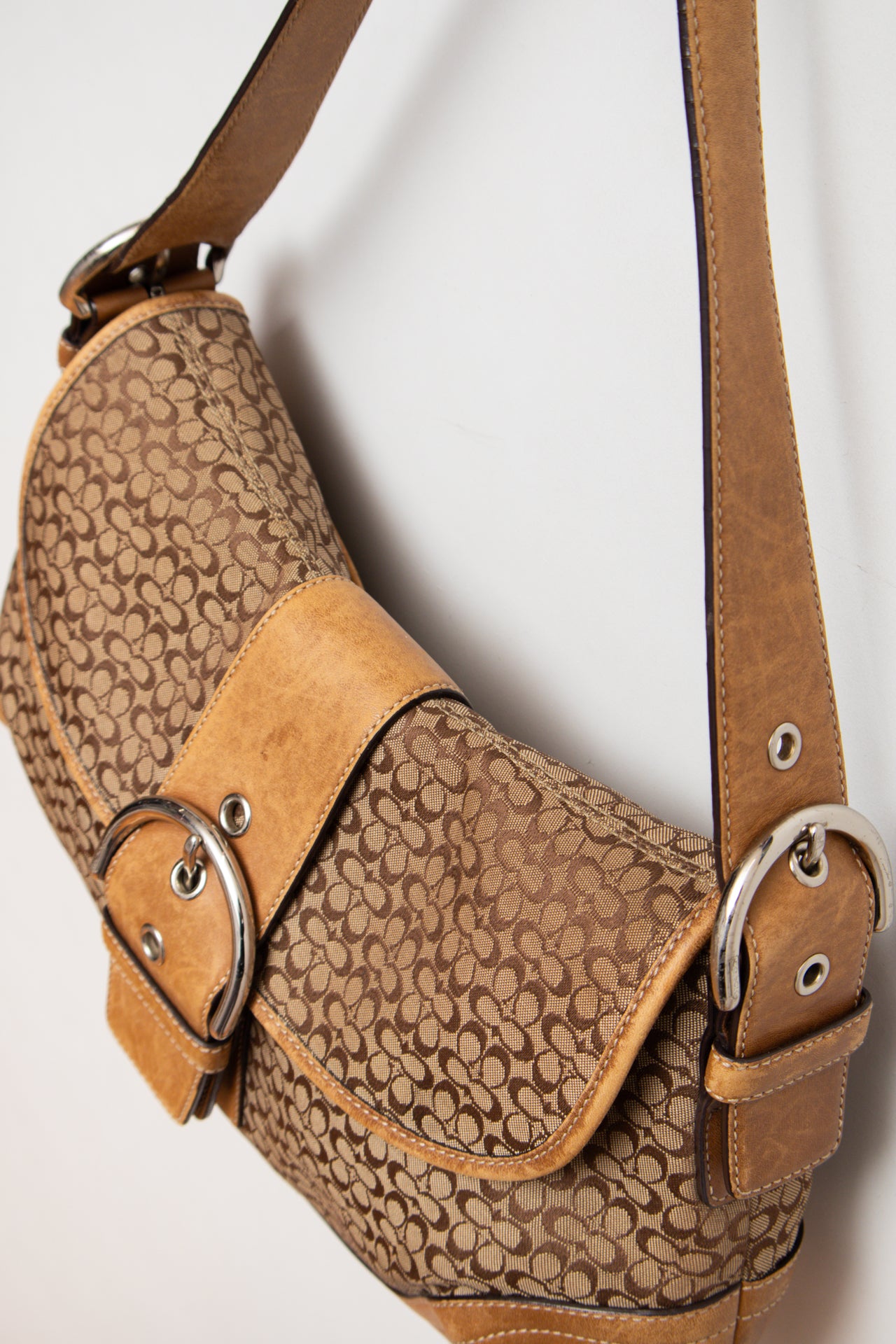 #245 Coach monogram buckle leather bag | c. 163