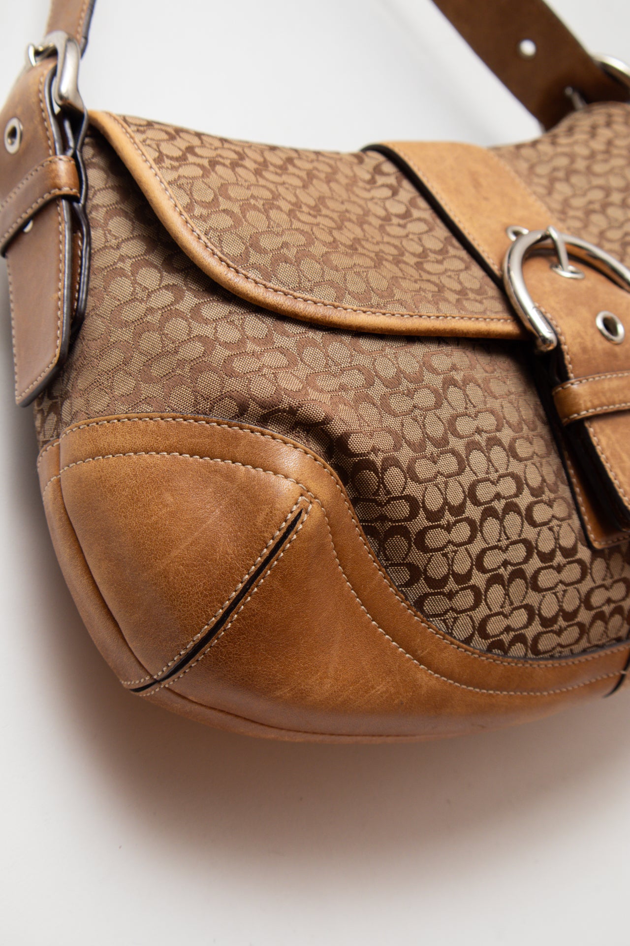 #245 Coach monogram buckle leather bag | c. 163