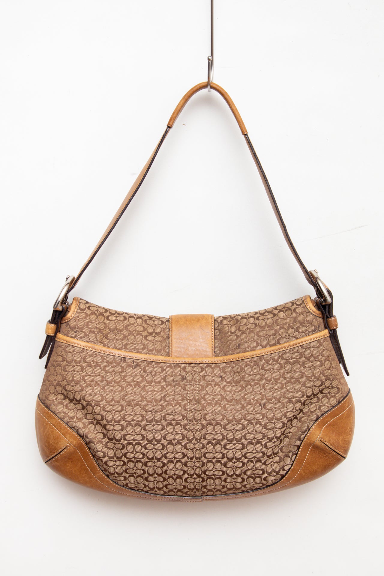 #245 Coach monogram buckle leather bag | c. 163