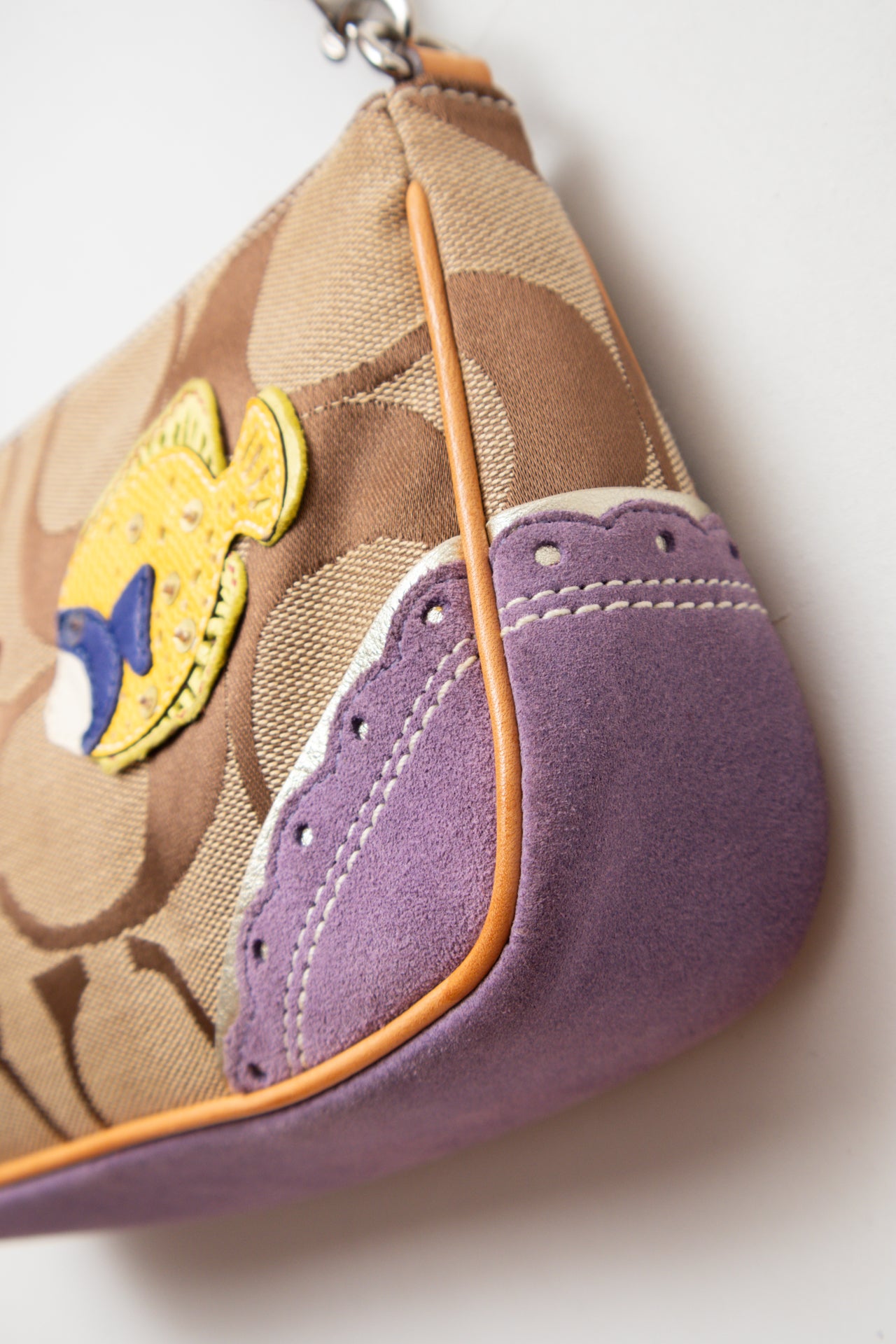 #242 Coach purple fish monogram demi bag | c. 163