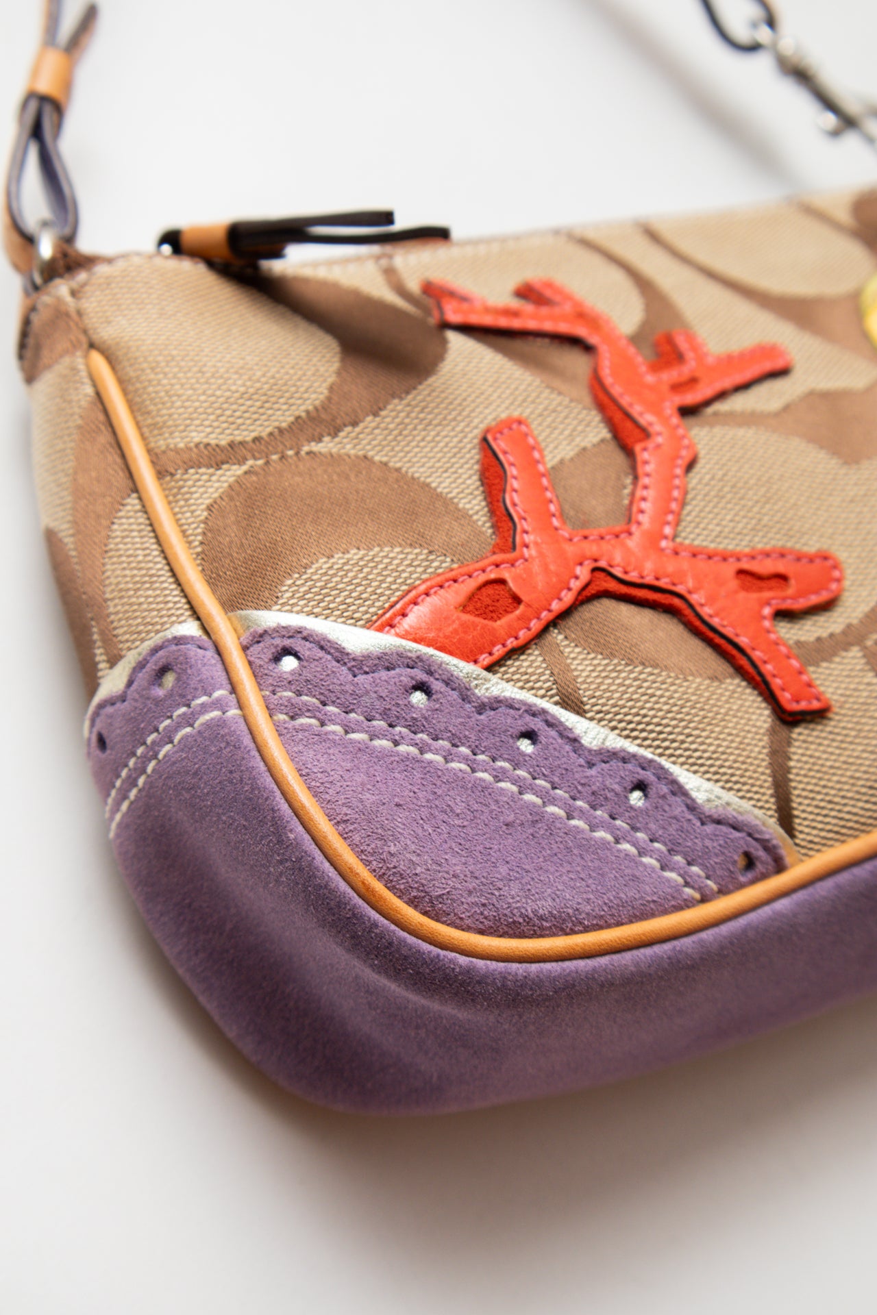 #242 Coach purple fish monogram demi bag | c. 163