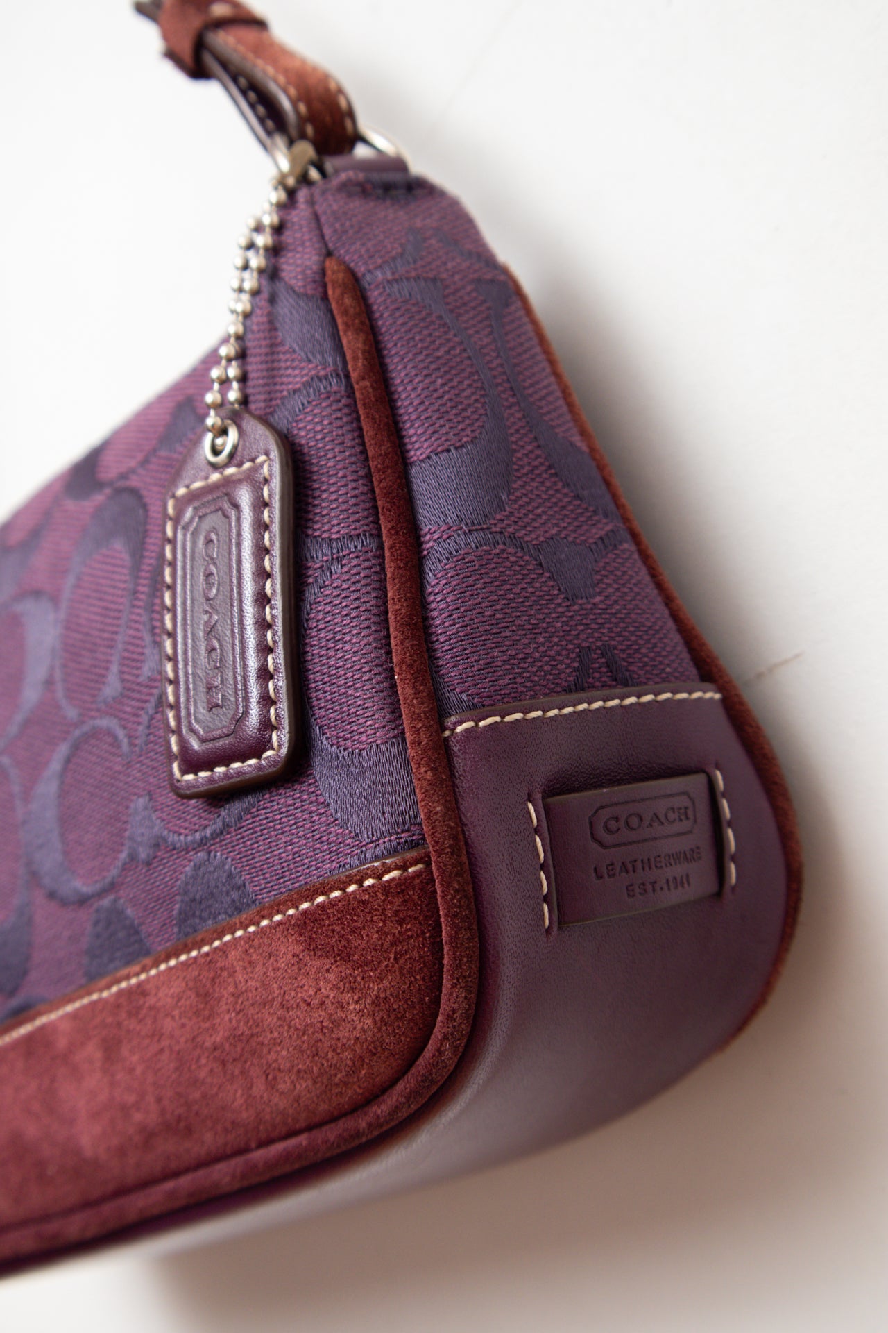 #243 Coach purple canvas monogram demi bag | c. 163