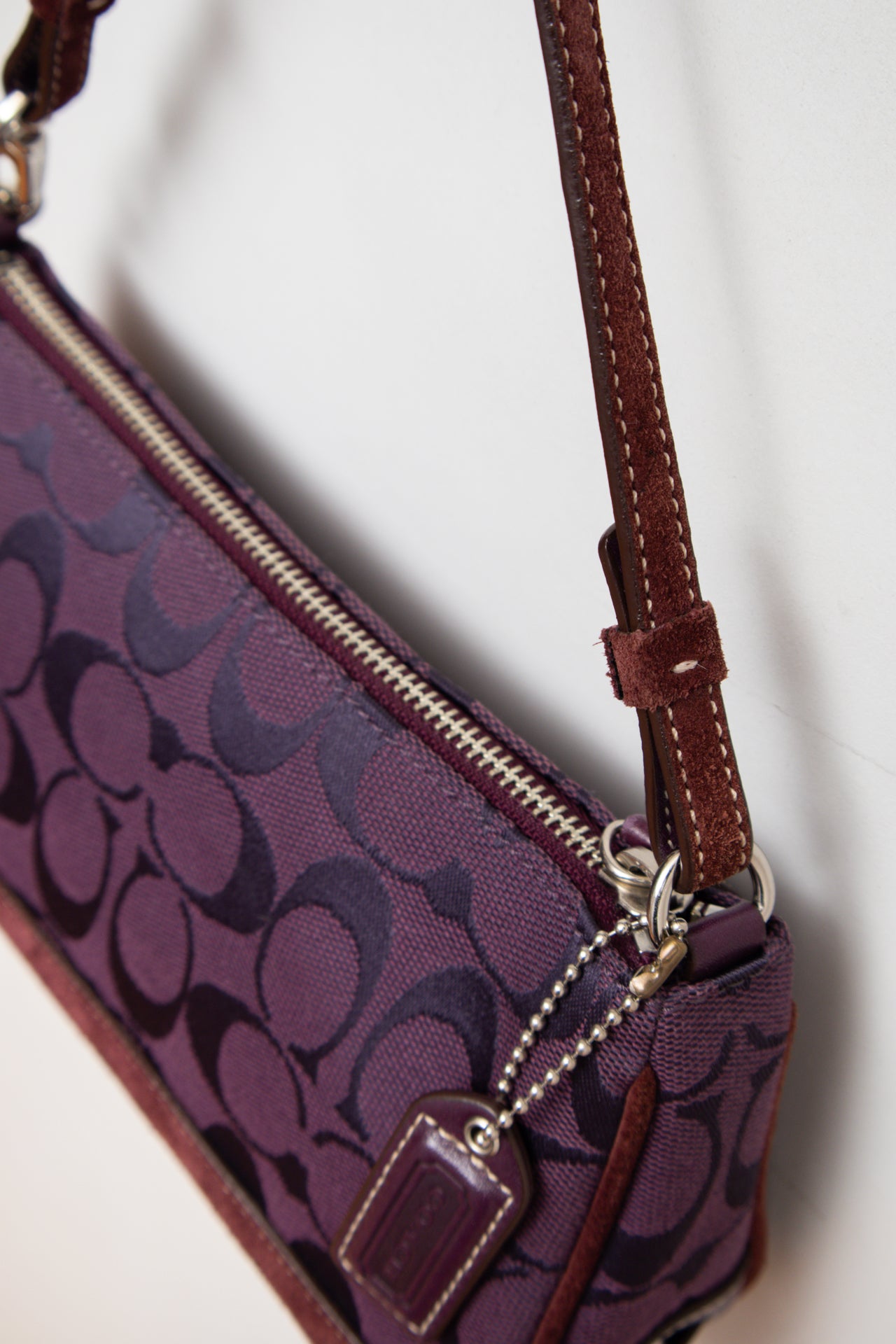 #243 Coach purple canvas monogram demi bag | c. 163