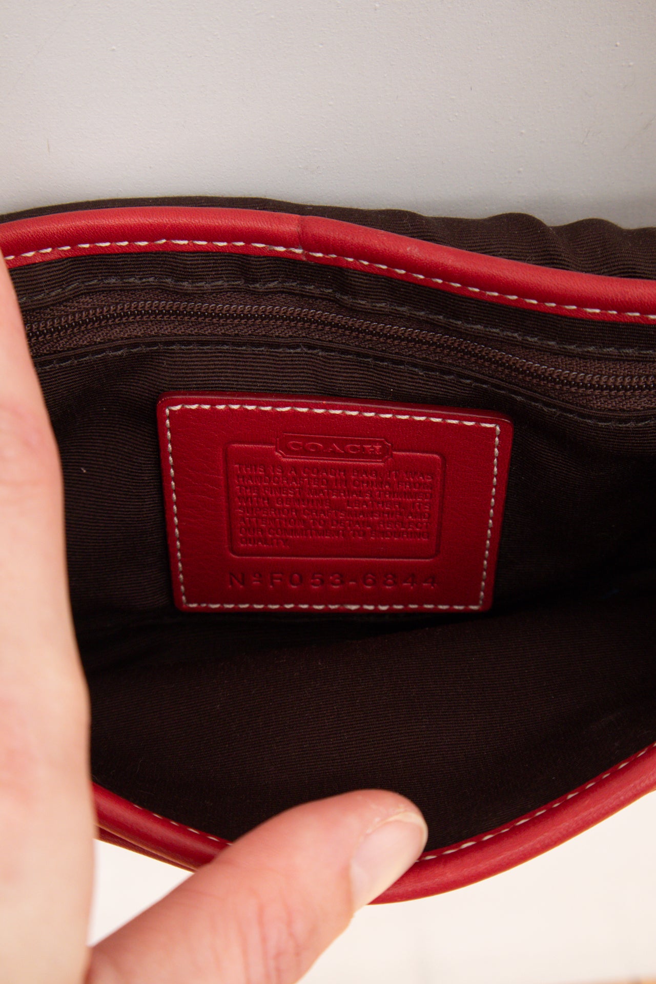 #247 Coach cherry red cross body buckle bag | c. 163
