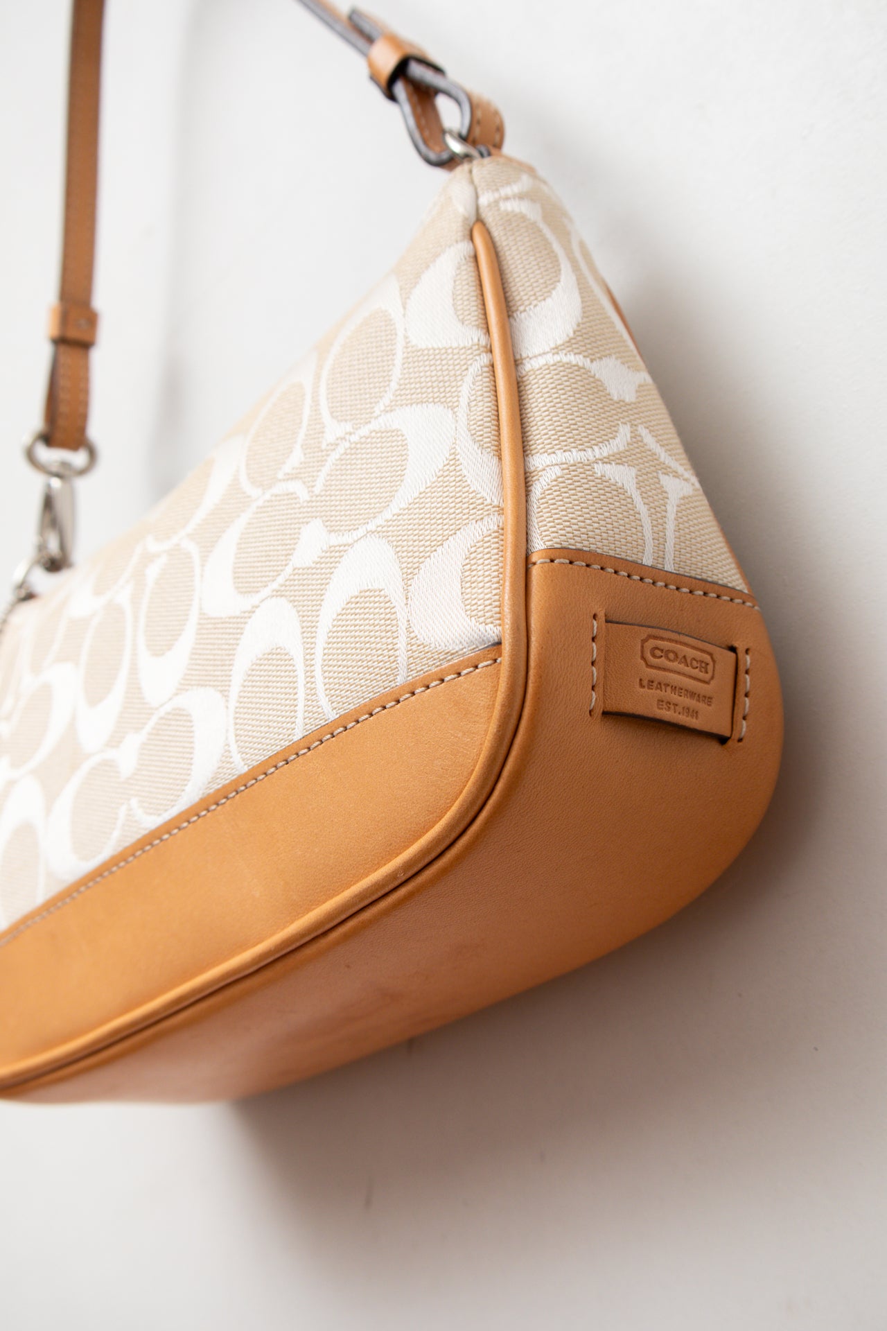 #188 Coach white canvas/leather monogram demi bag | c. 164