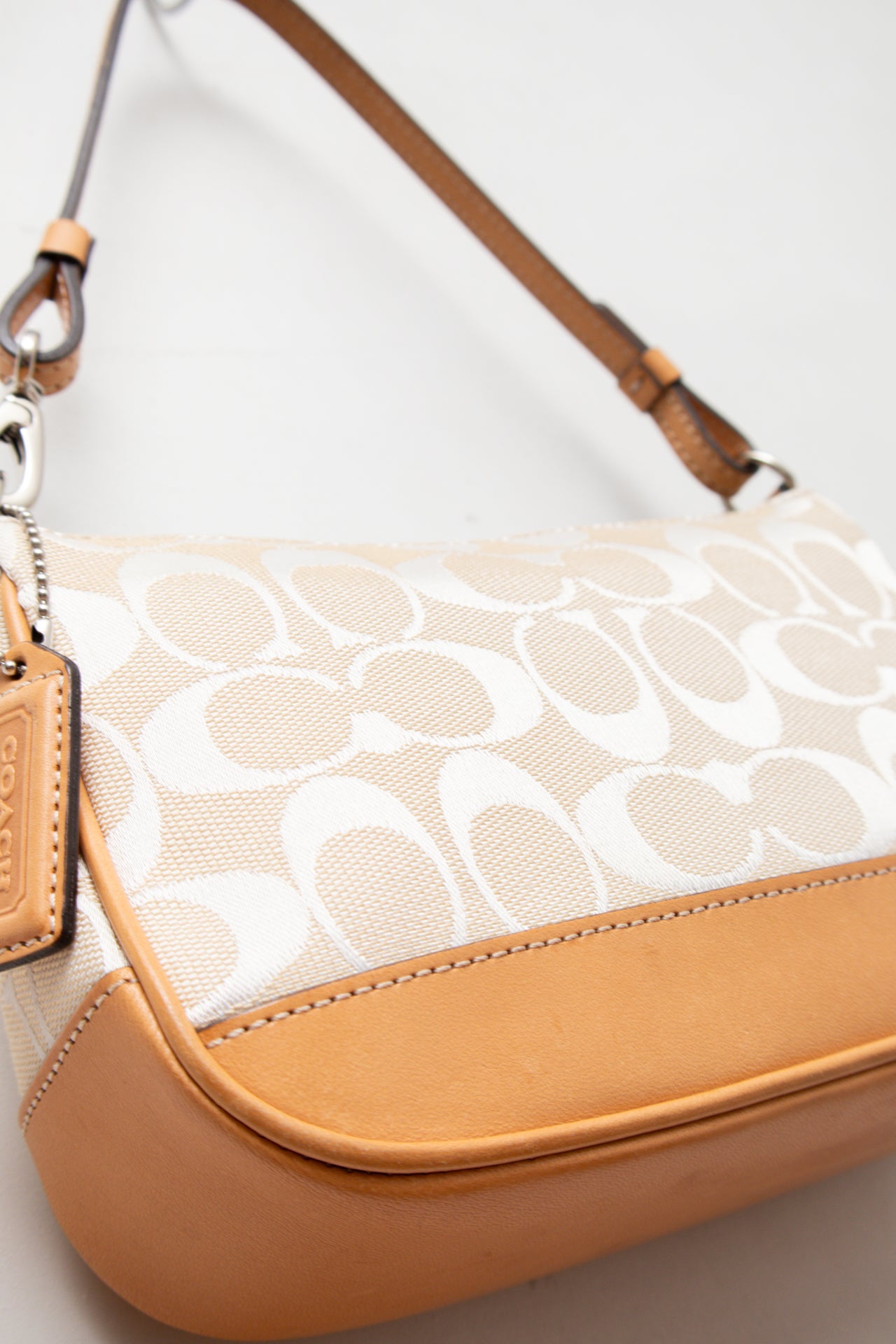 #188 Coach white canvas/leather monogram demi bag | c. 164