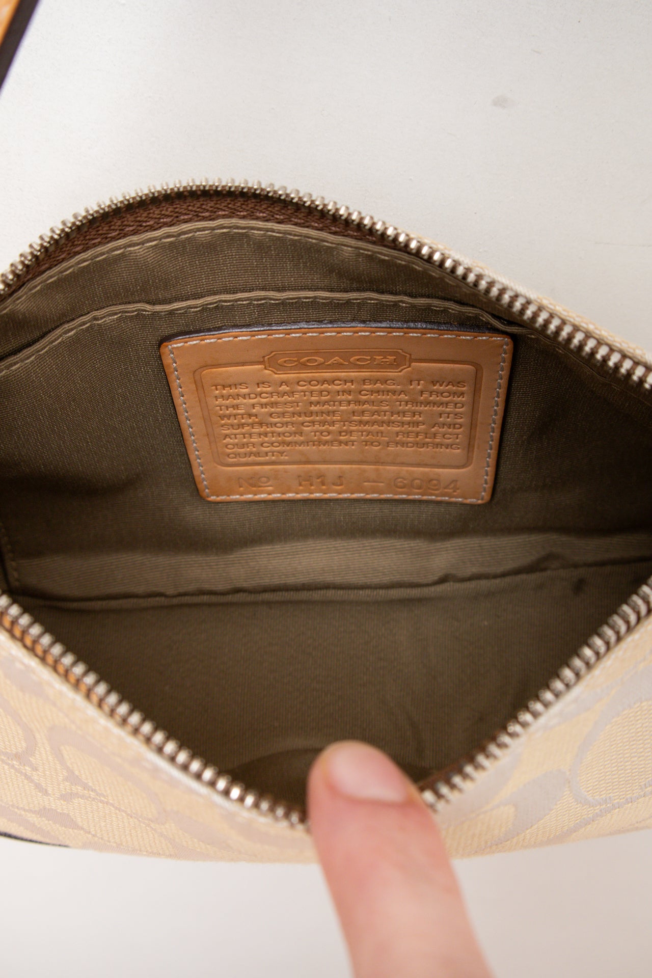 #188 Coach white canvas/leather monogram demi bag | c. 164