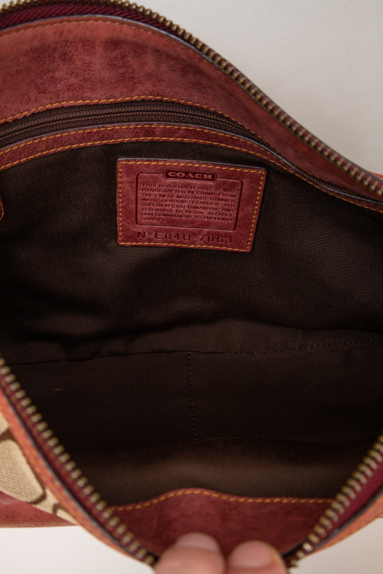 #192 Coach burgundy suede buckle bag | c. 164