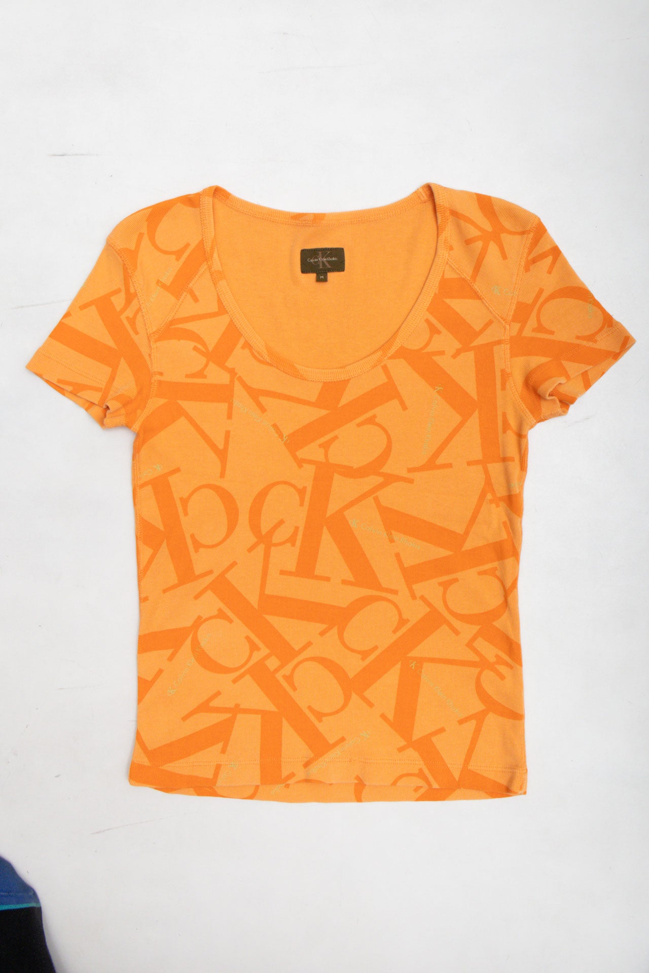 #33 Calvin Klein Orange Tee | Collection 140 | Size 10