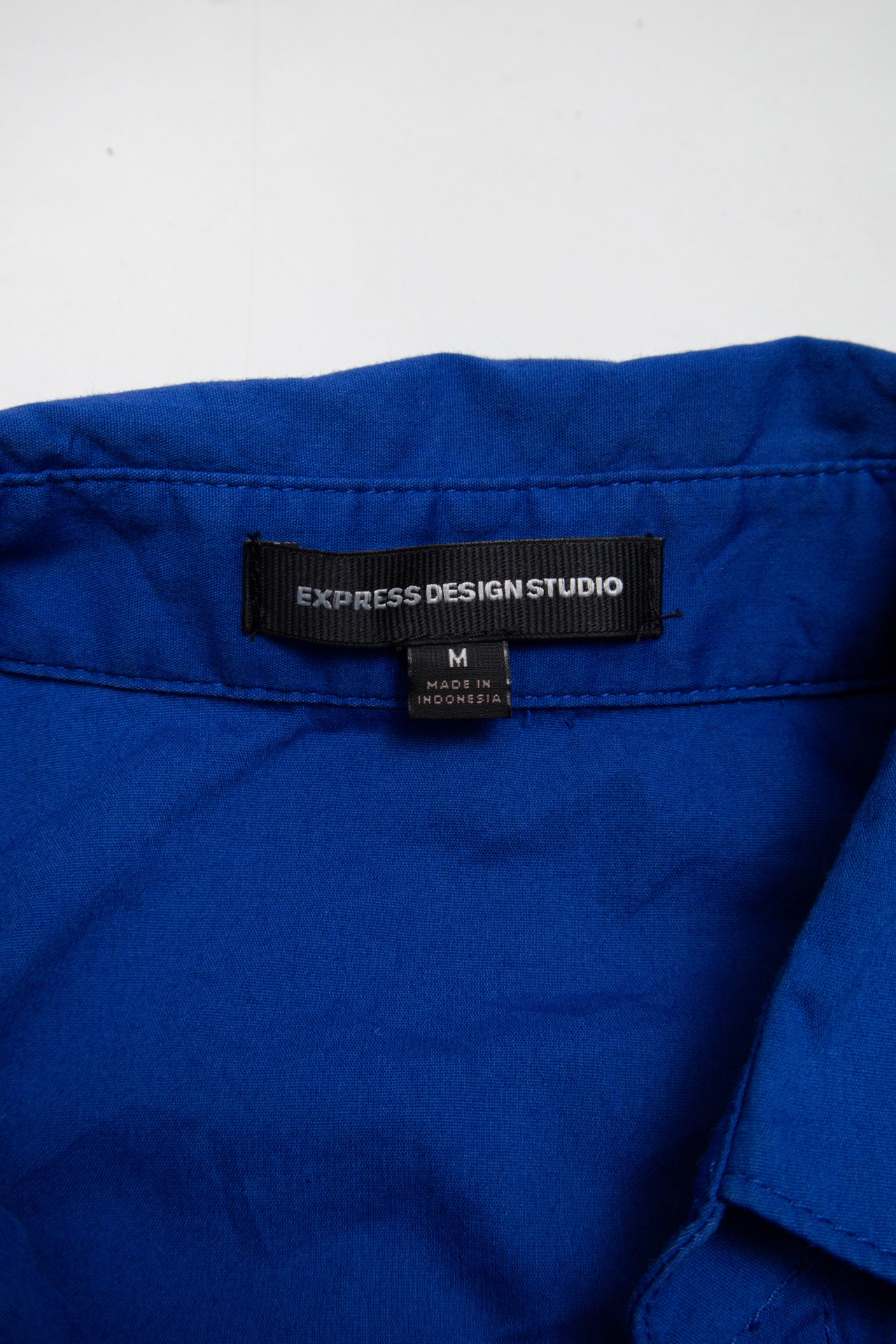 #153 Express royal blue fitted button up | c. 165 | size 8