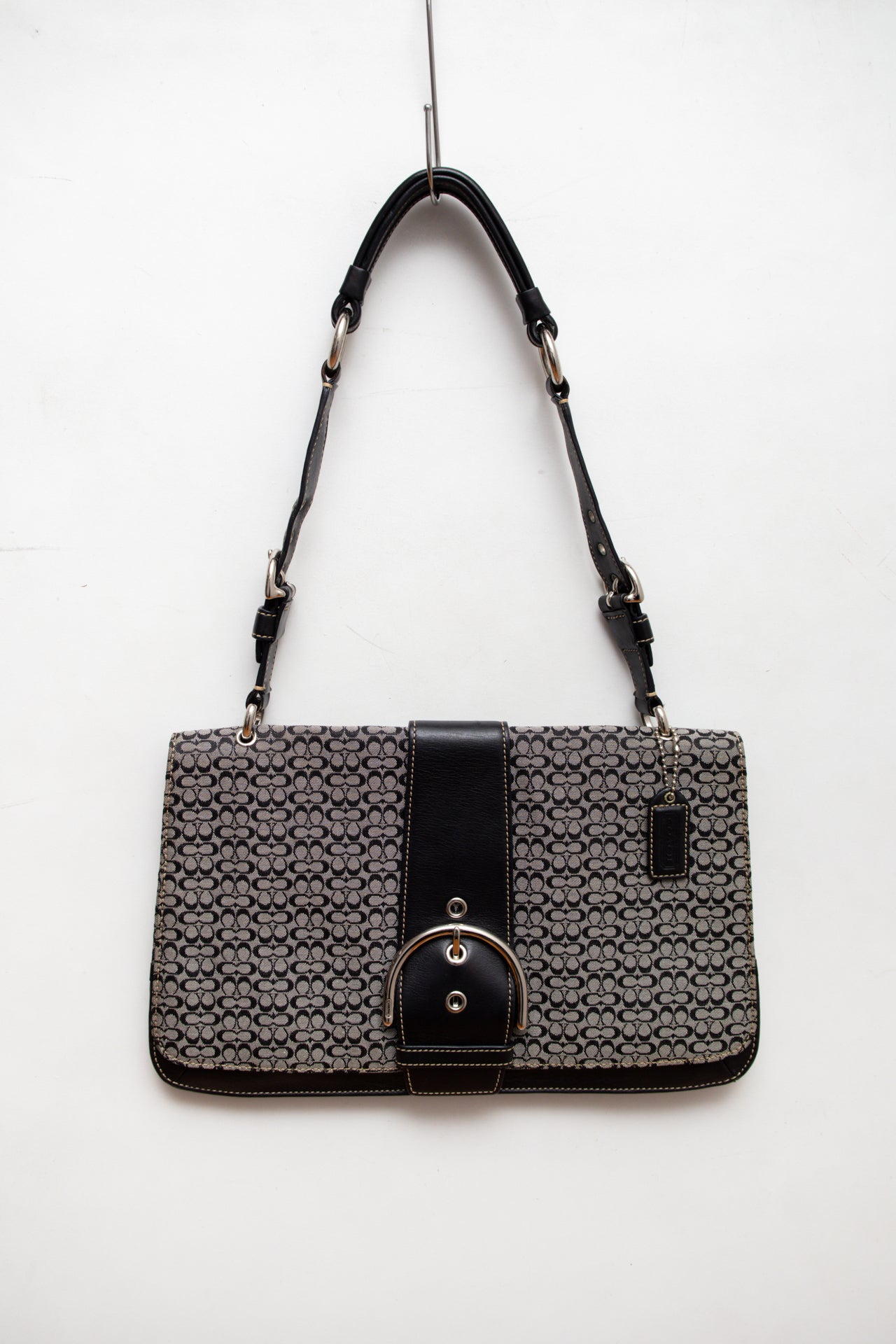 #225 Coach monogram buckle bag | c. 165