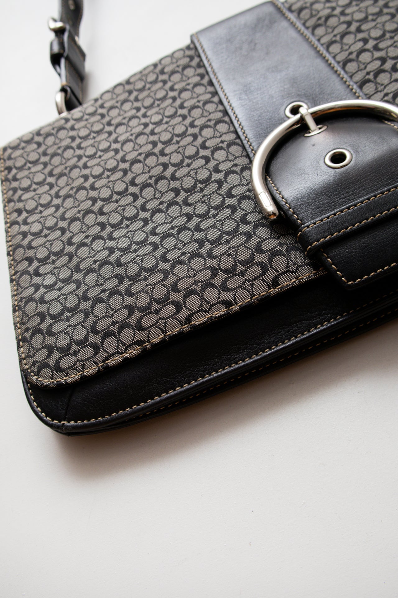 #225 Coach monogram buckle bag | c. 165