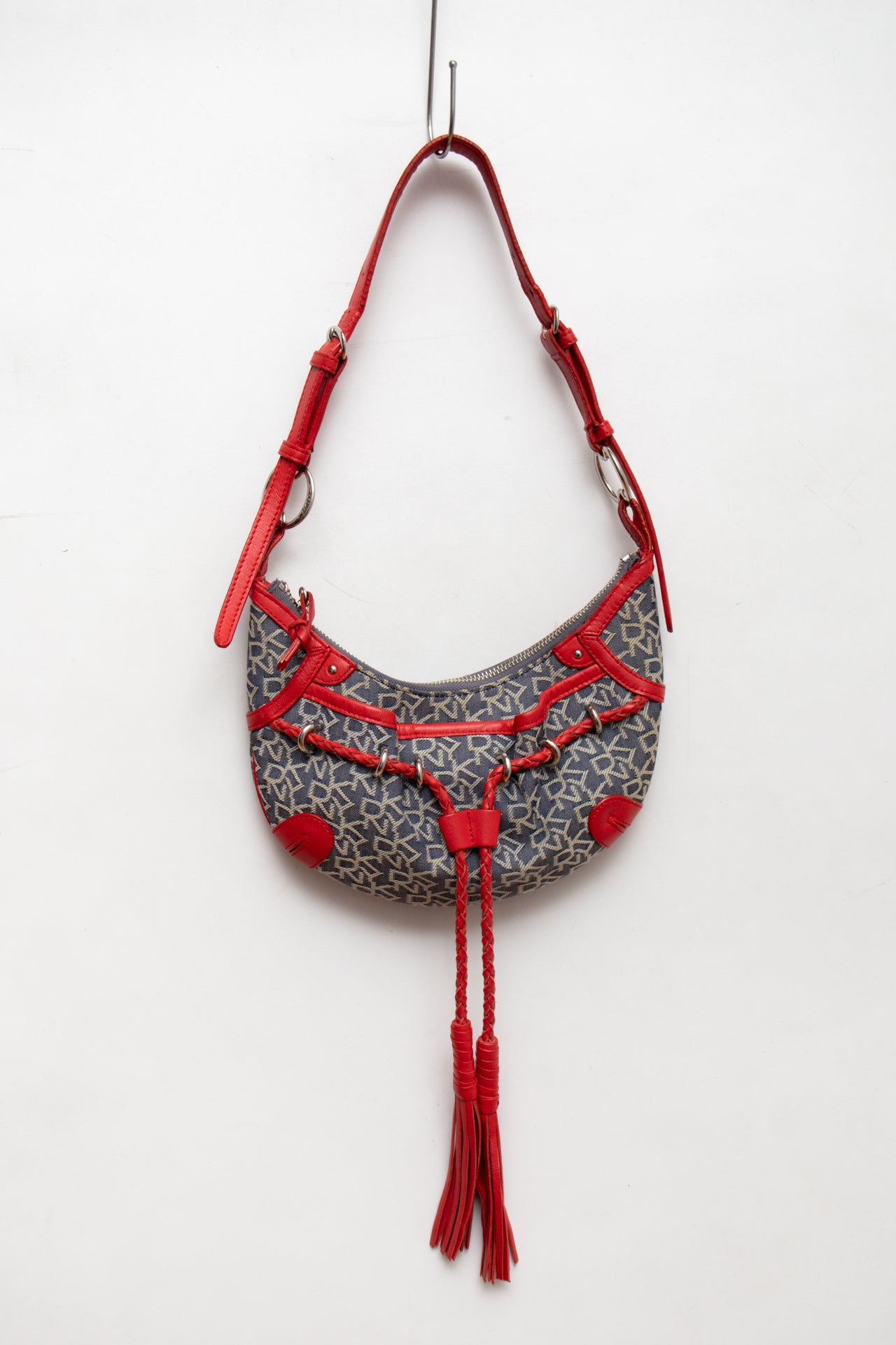 #228 DKNY leather tassel bag | c. 165