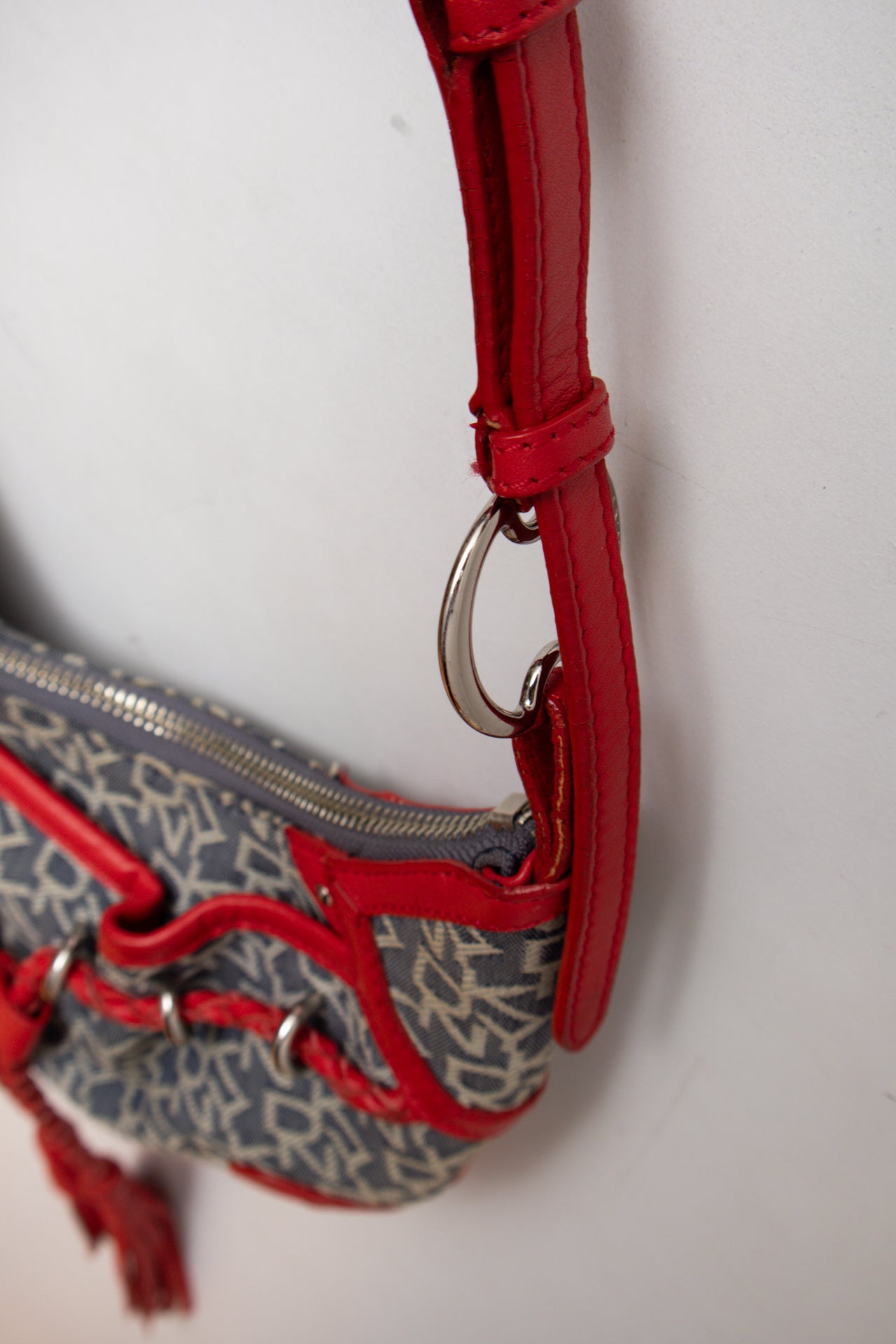#228 DKNY leather tassel bag | c. 165