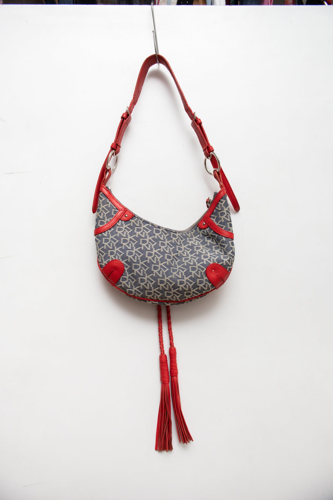 #228 DKNY leather tassel bag | c. 165