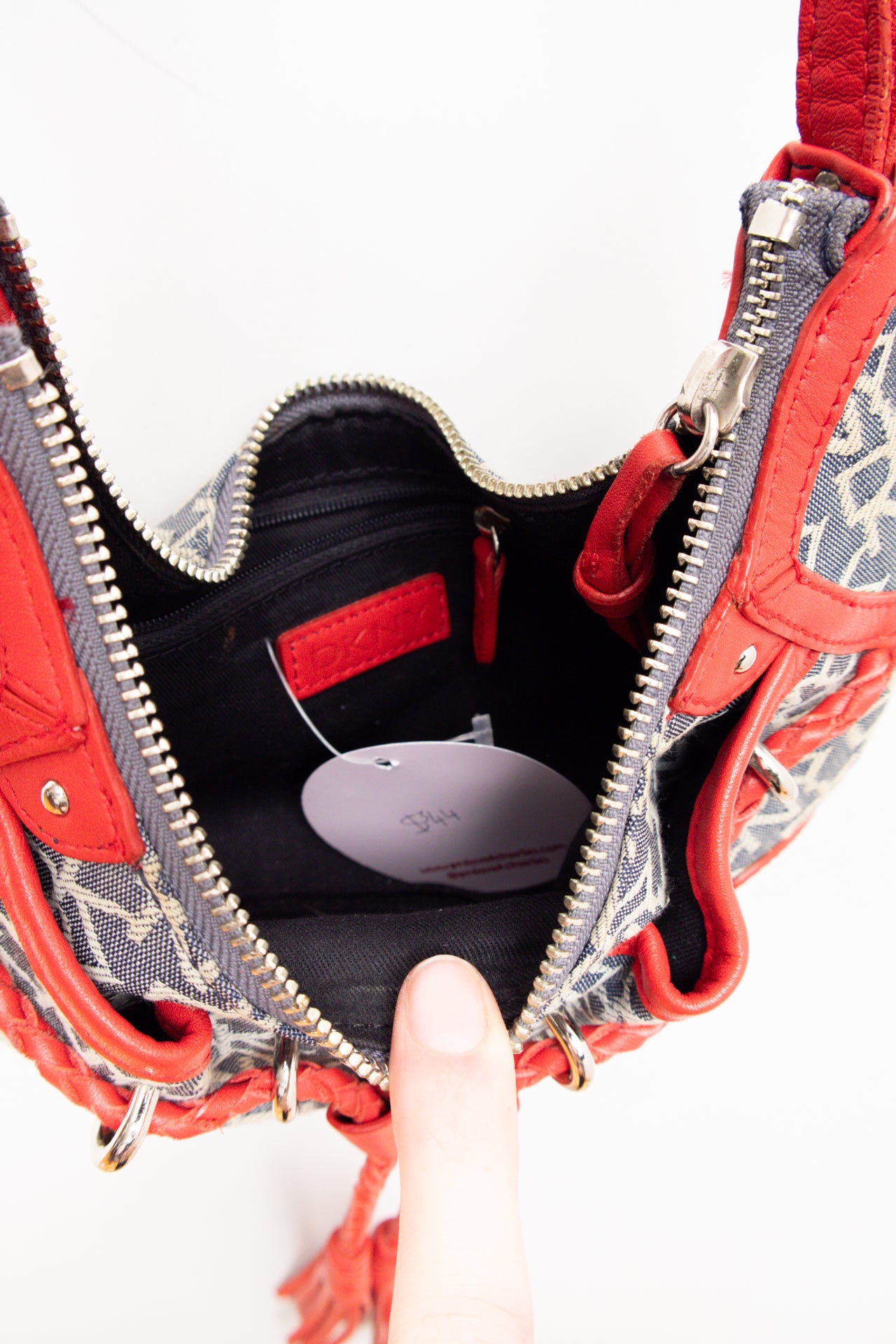 #228 DKNY leather tassel bag | c. 165