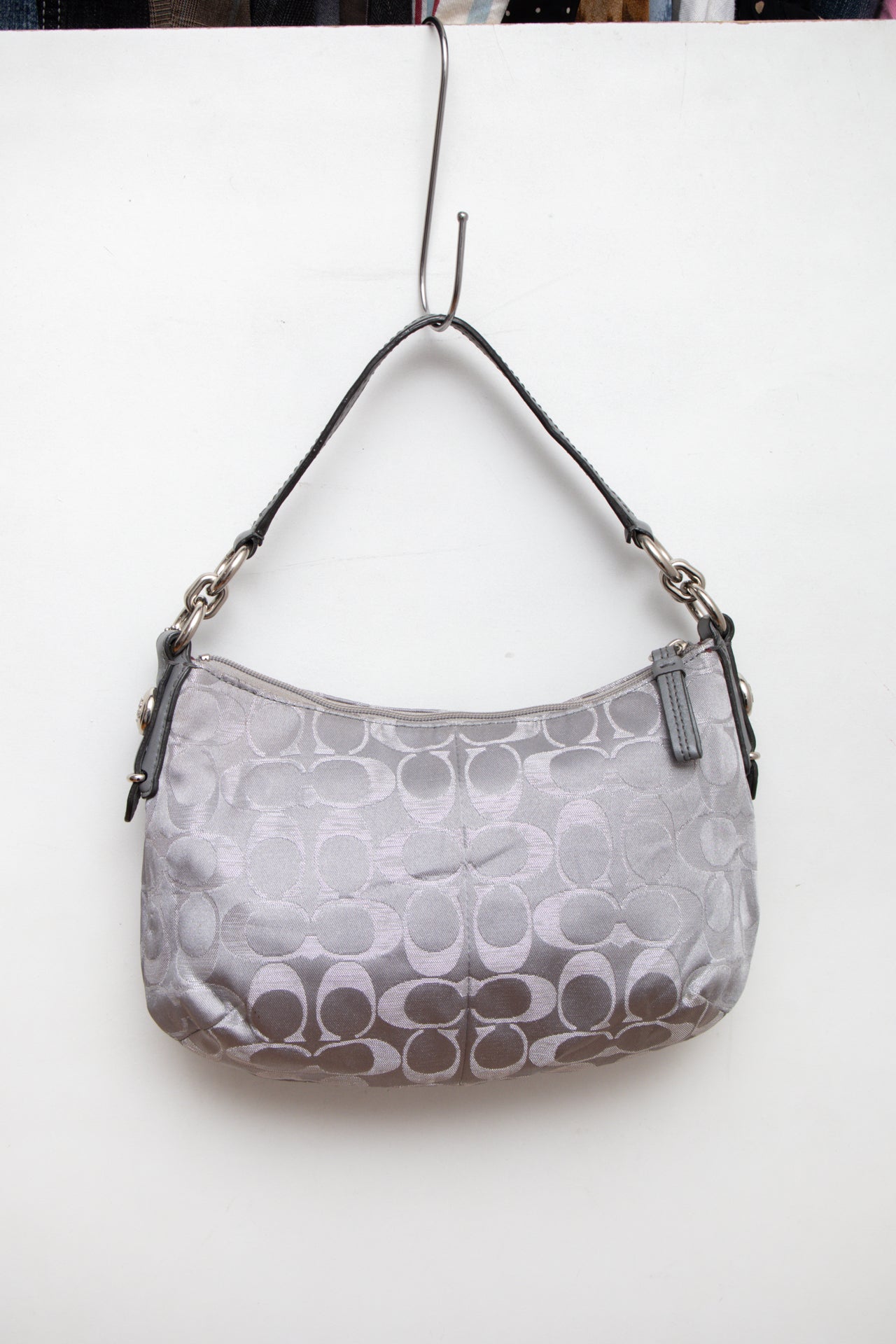 #231 Coach silver monogram bag | c. 165