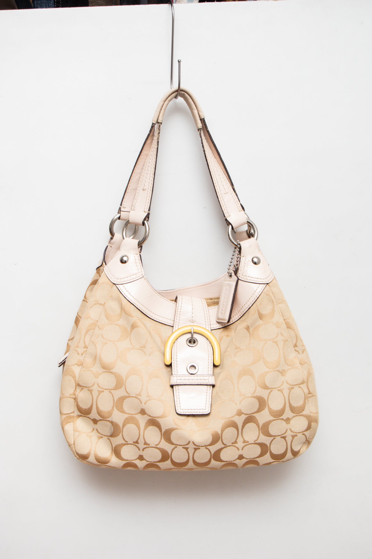 #232 Coach monogram cream/pink buckle bag | c. 165