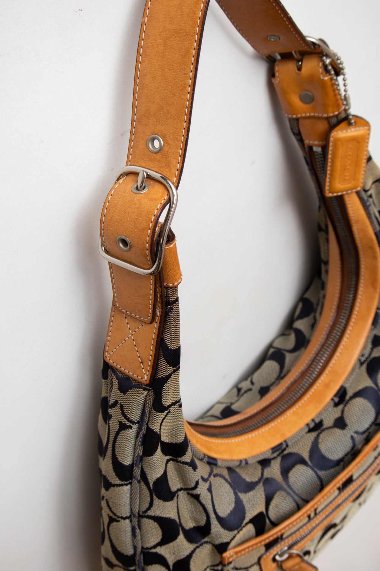 #234 Coach navy monogram bag | c. 165