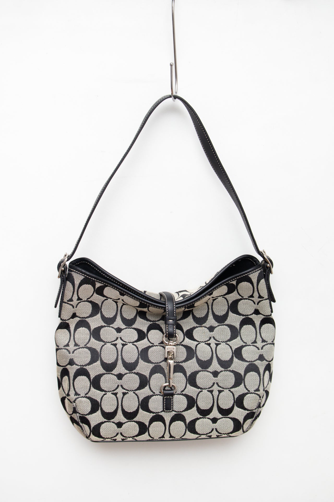 #239 Coach monogram clasp bag | c. 165