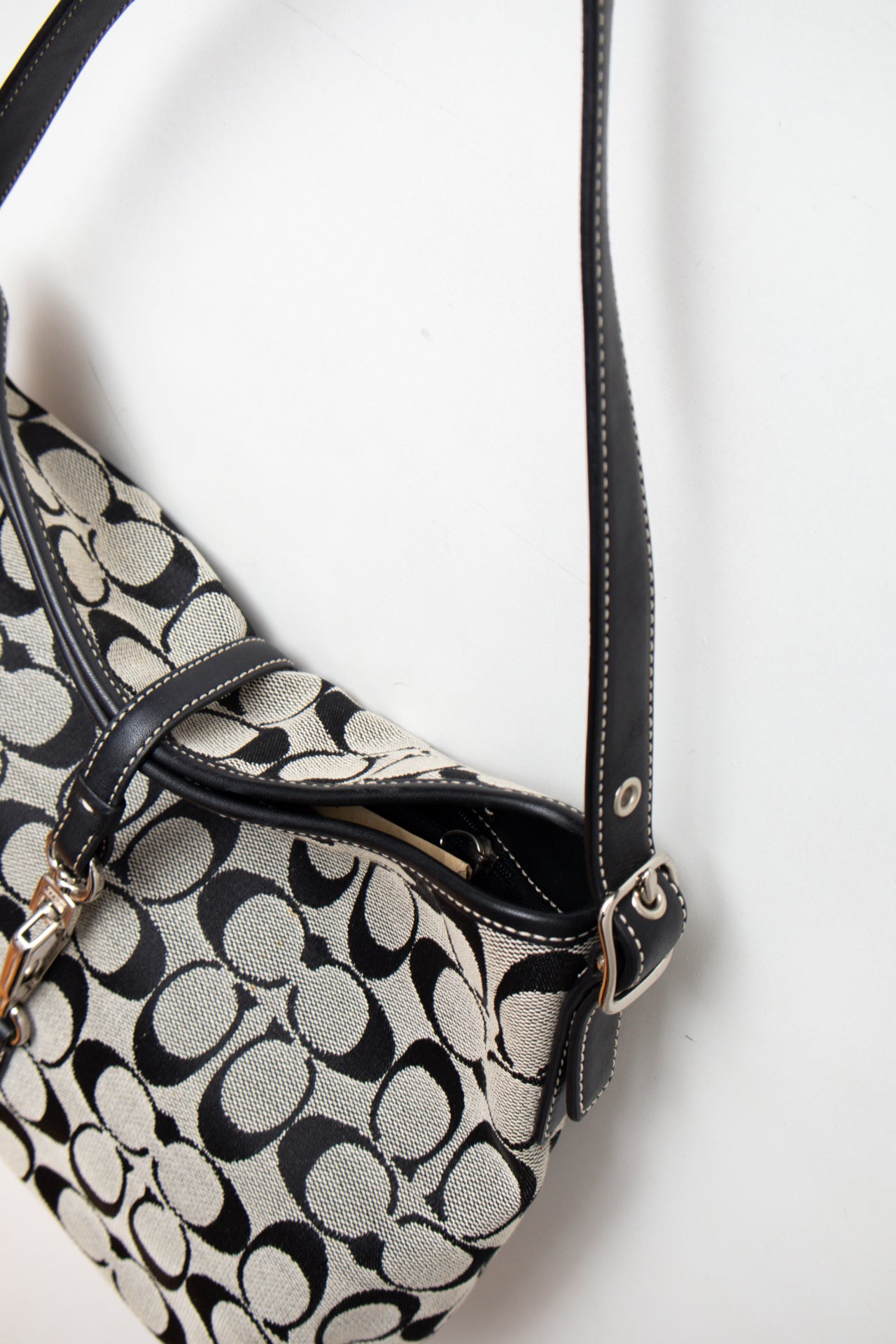 #239 Coach monogram clasp bag | c. 165