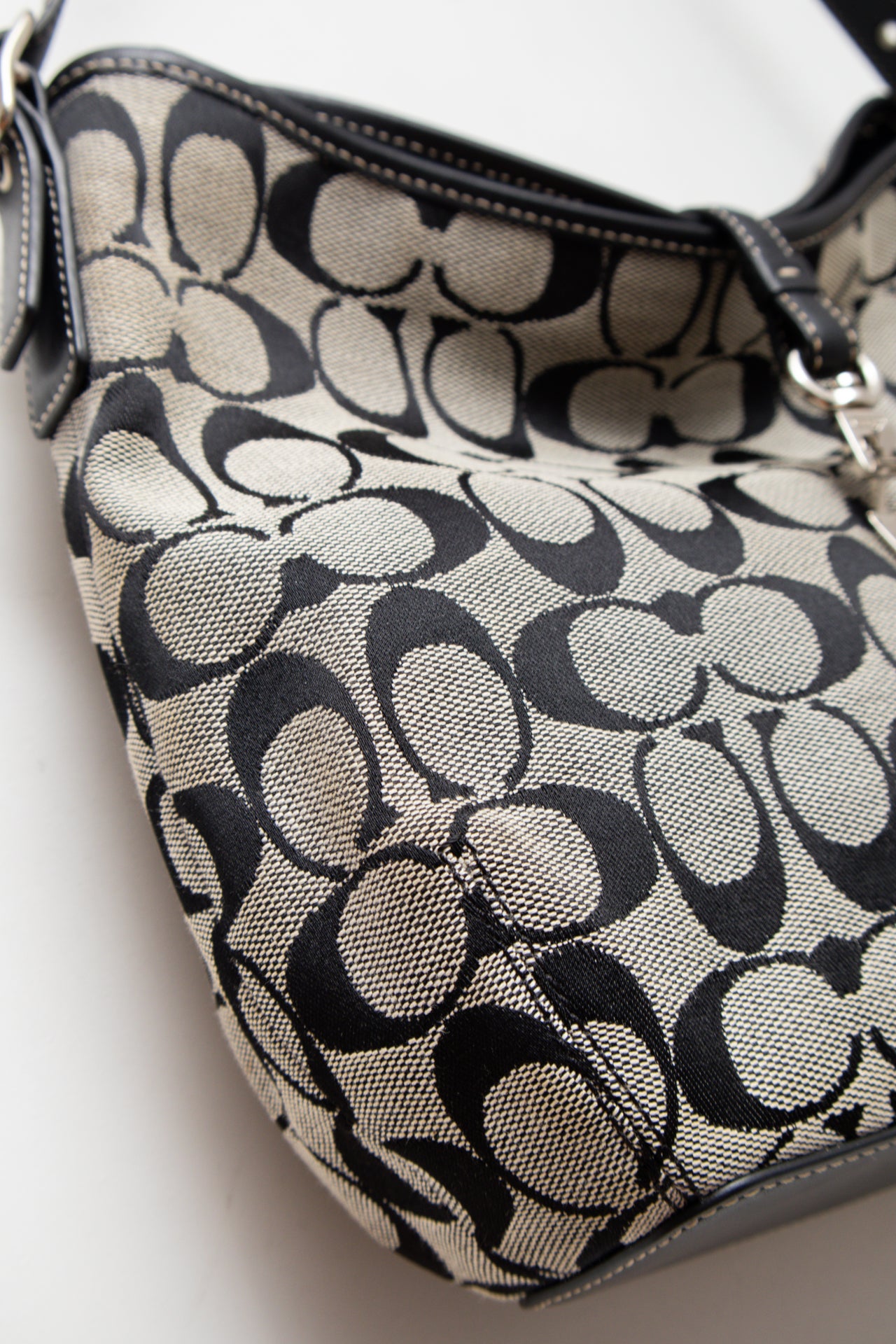 #239 Coach monogram clasp bag | c. 165