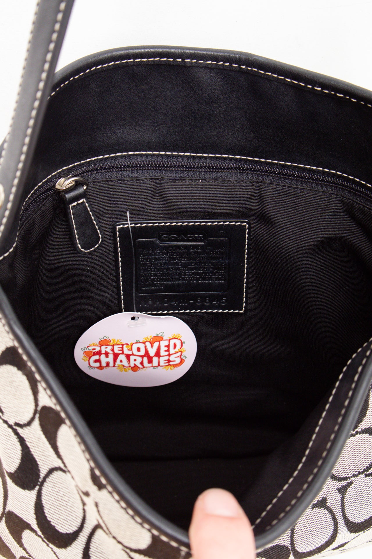 #239 Coach monogram clasp bag | c. 165