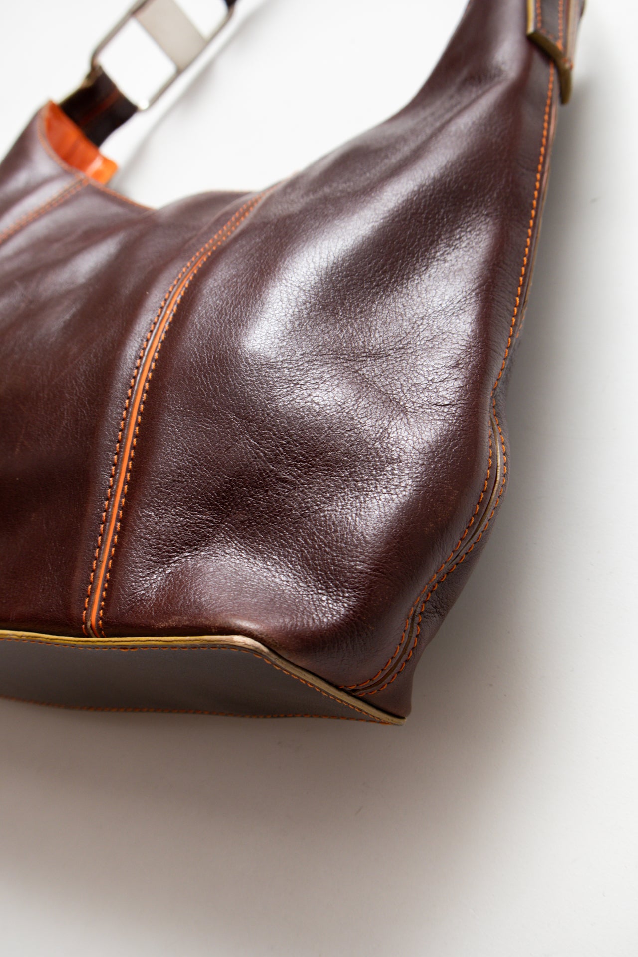 #242 Ann Klein patent leather orange stitch bag | c. 165