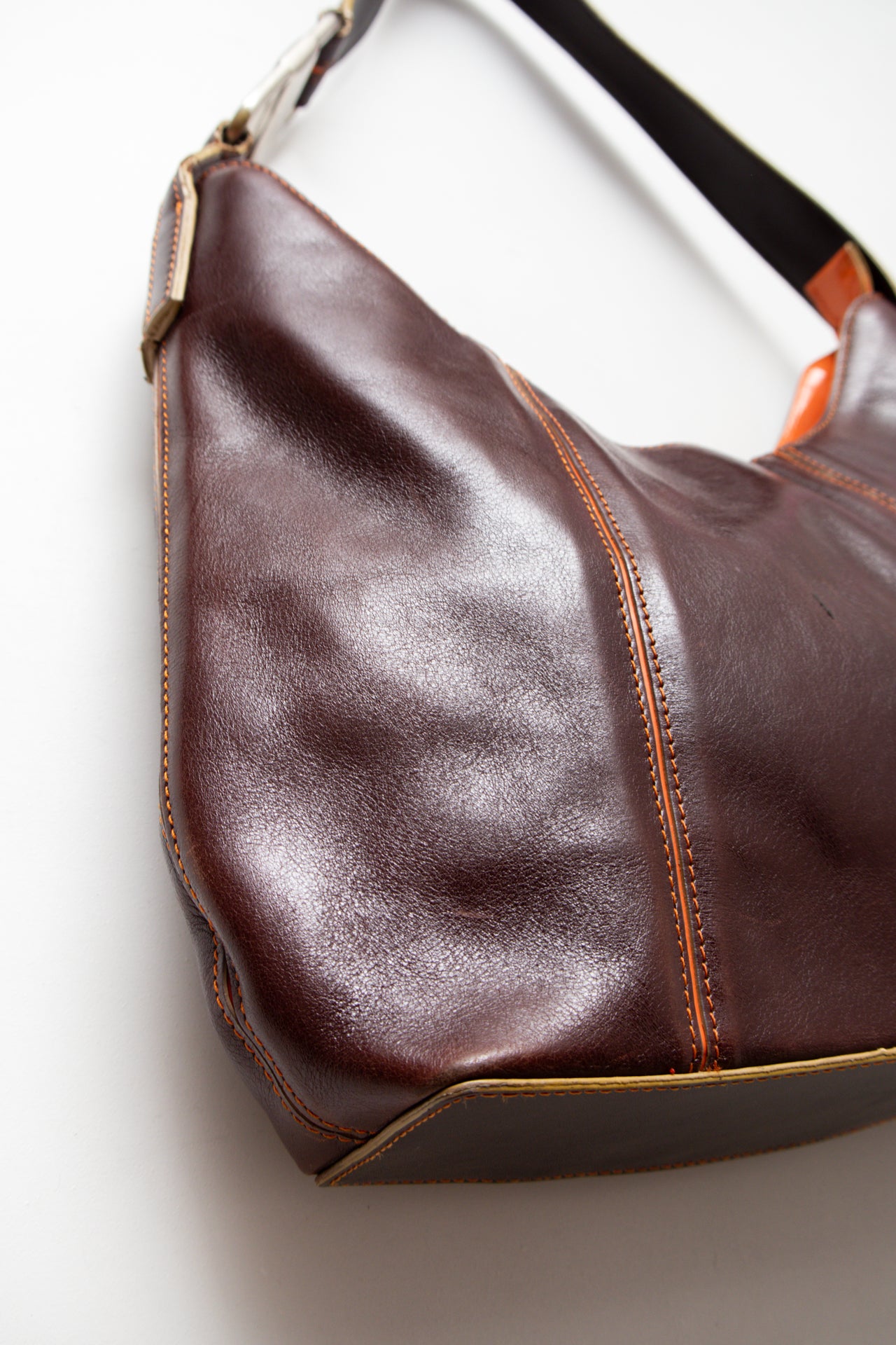 #242 Ann Klein patent leather orange stitch bag | c. 165