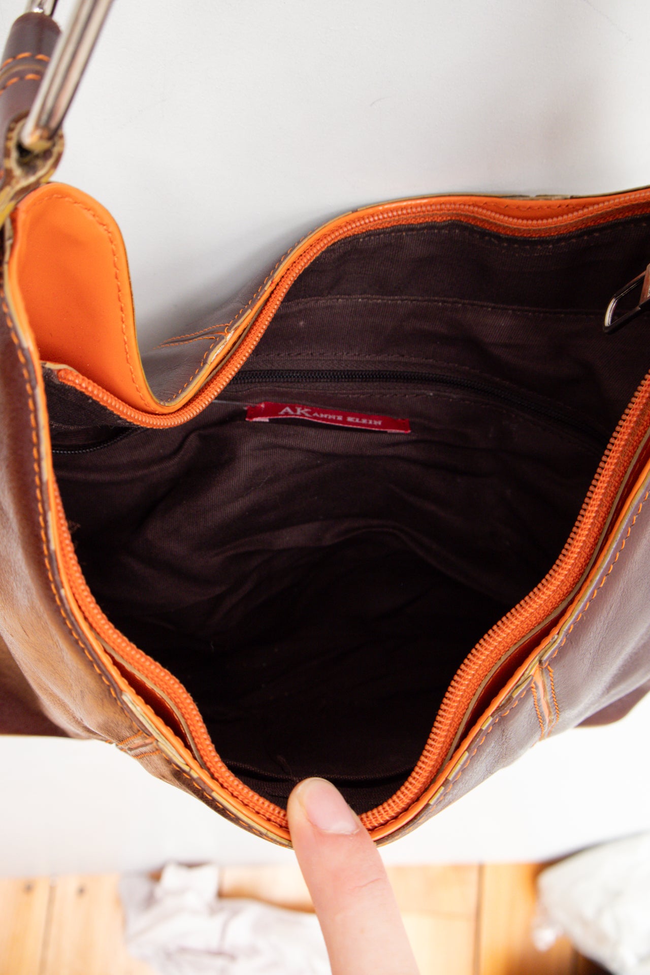 #242 Ann Klein patent leather orange stitch bag | c. 165