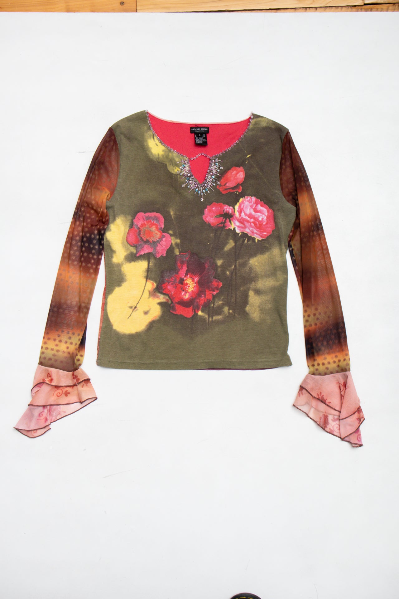 #64 Printed beaded top w mesh sleeves | Size 10 | C. 152