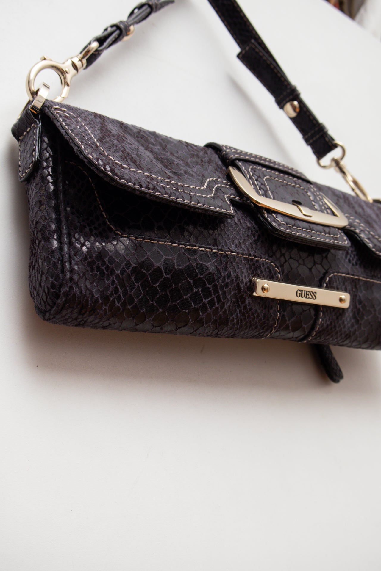 #246 Guess snake print strapped clutch | c. 158