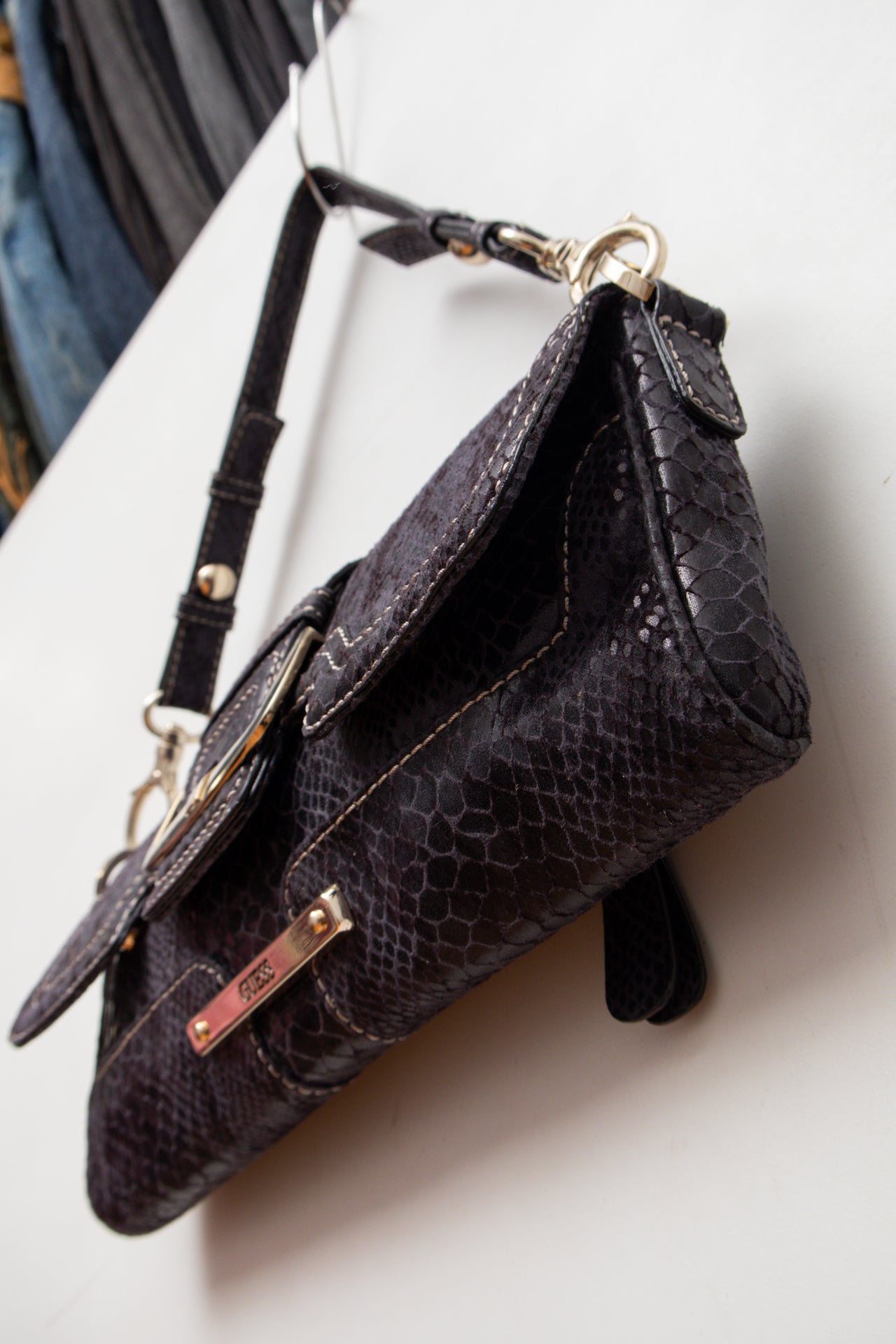 #246 Guess snake print strapped clutch | c. 158