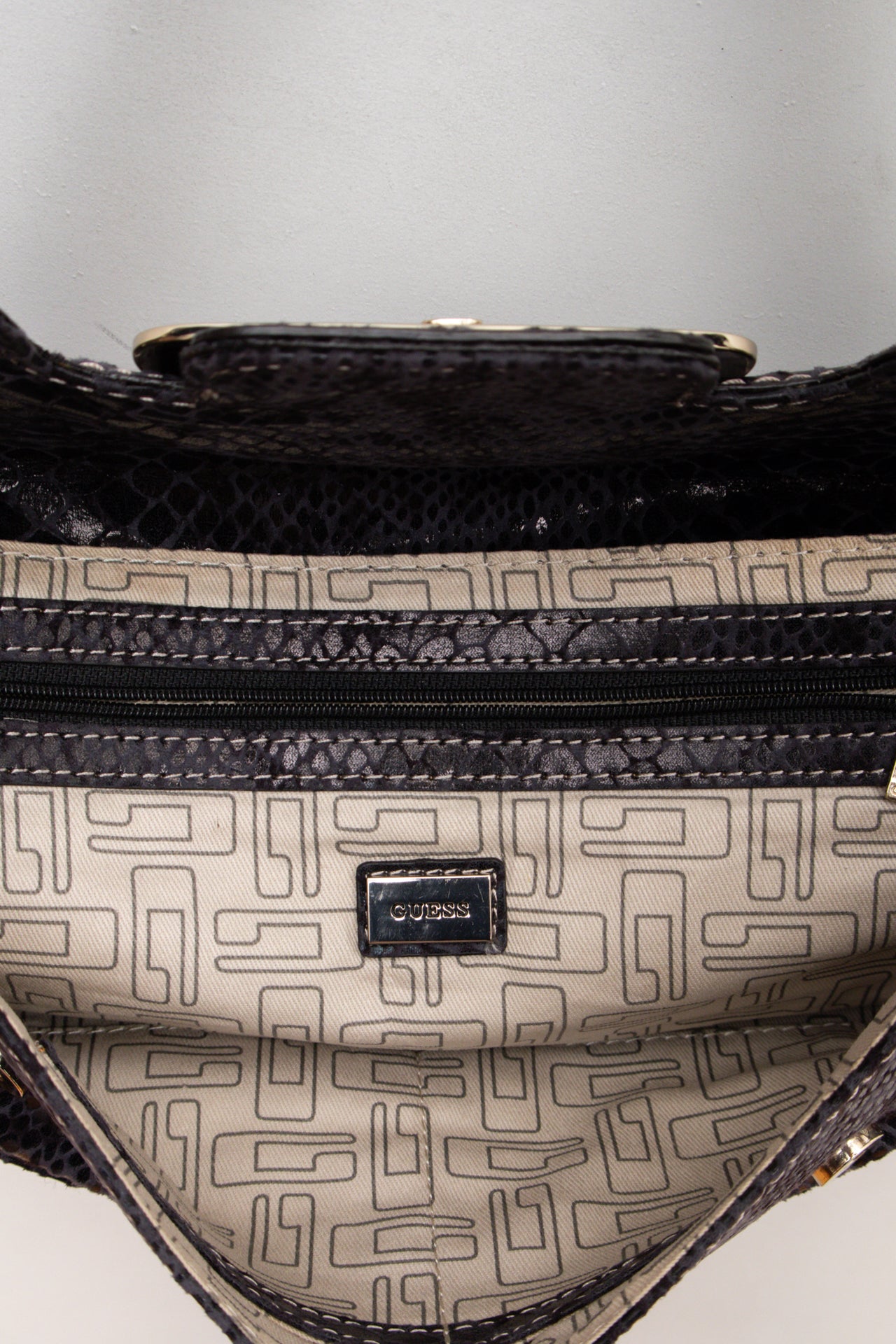 #246 Guess snake print strapped clutch | c. 158
